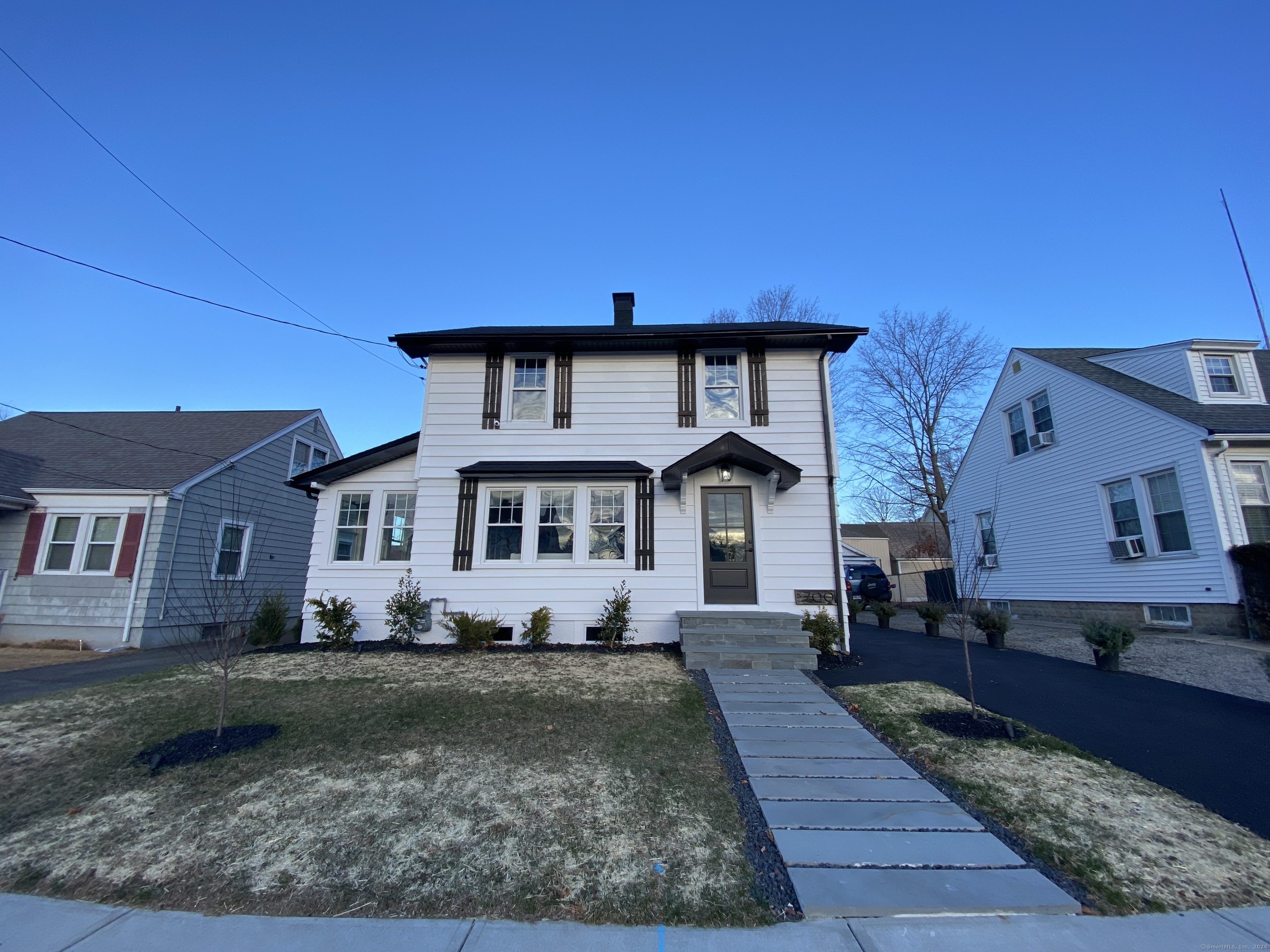 Welcome to 700 Cleveland Avenue in the desirable Brooklawn neighborhood of Bridgeport. This lovely colonial has been tastefully updated with current designer-styled finishes and it shows! You enter via the covered front porch and you are in the foyer vestibule with coat closet. As you step further into the home you've got a clear view of the living room, office/den/play room, and then wide doorway into the dining room and finally a view into the well lit kitchen. The holidays can be festive, bright and yours in this remodeled colonial. The kitchen with breakfast bar, wine chiller, white quartz counters and gas range and designer tile flooring all make this home contemporary and inviting. Upstairs you have 3 generous bedrooms and one large, full bathroom. The closets are great in the bedrooms. On the 3rd floor you've got flex space. It can be an overflow space for guests; an office; a playroom; an exercise room/yoga quiet retreat space etc. It is what you need it to be! The lower level is unfinished and ready to store your summer toys! The roof, gutters, and exterior doors are brand new; the basement windows and garage door are new. The lighting fixtures are new and lovely I might add! You have a gas range for chef level cooking too. The home has both oil and gas service. Come check out this lovely and so convenient home in the Brooklawn market area of Bridgeport.