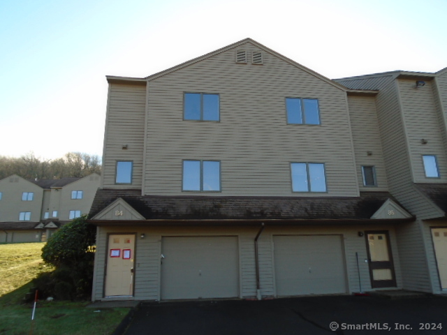 This sought after Southridge condominium features 2 large bedrooms and 1.5 bathrooms. The main level of this unit features an Eat-In-Kitchen, 1/2 bathroom, large living room with fireplace and sliders to your own private patio that looks out to the back area of the complex. The bedroom floor features 2 spacious bedrooms with a good amount of closet space and a full bathroom. Central air. Basement laundry and attached garage. Great views of Bristol and located in a convenient location to highways, shopping, parks and schools.