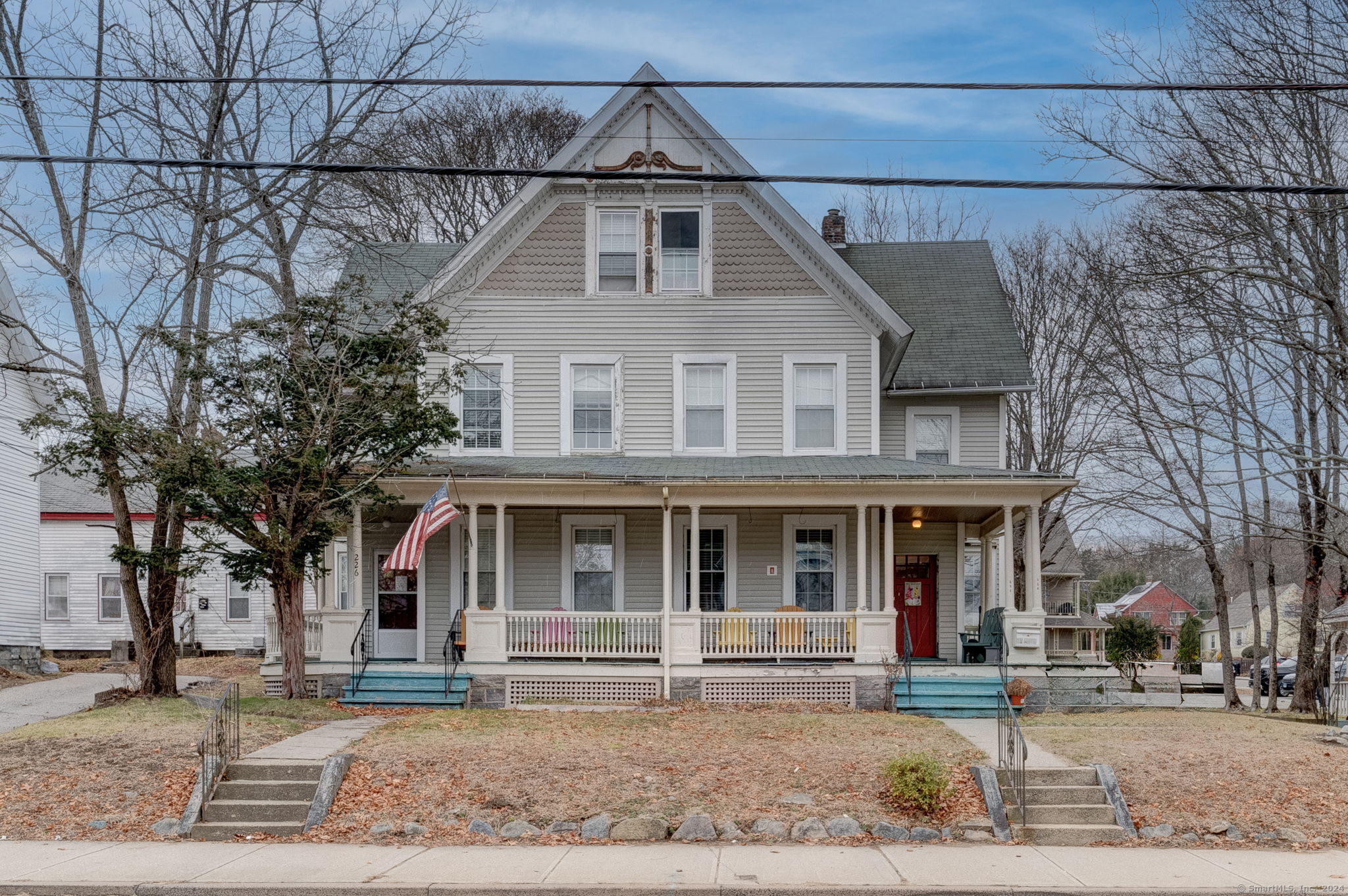 Exceptional Investment Opportunity in Willimantic - 226-228 Jackson Street. Discover the potential of this 10-bedroom Victorian-style two-family home, a landmark property with tremendous versatility. Most recently operated as transitional housing, this property is perfect for investors seeking high returns, whether through continued program use, repurposing as a two-family dwelling, or exploring other income-generating opportunities. Approved for 10-12 bedrooms, this home offers an expansive floor plan adaptable to various uses. Modernized Infrastructure: A major rehabilitation in 1996, with further updates in 1999-2000, ensures the property is in very good overall condition. Key systems are fully operational, with consistent maintenance. Enhanced Safety Features: Includes a full sprinkler system, video/audio wiring, and telecommunications infrastructure, all reflective of its previous use with state funding and regular inspections for code and fire compliance. Lots of original trim, doors, and casings showcase the home's 1900s character, complemented by a picturesque front porch, multiple entry points, and elegant curb appeal. Ample Parking and Accessibility: A massive paved parking area and fully accessible ramp provide convenience and flexibility for tenants or guests. Sitting on over 0.5 acres in the NPR zone, there is potential to subdivide a second lot, enhancing the investment value. A unique investment with substantial upside potential.