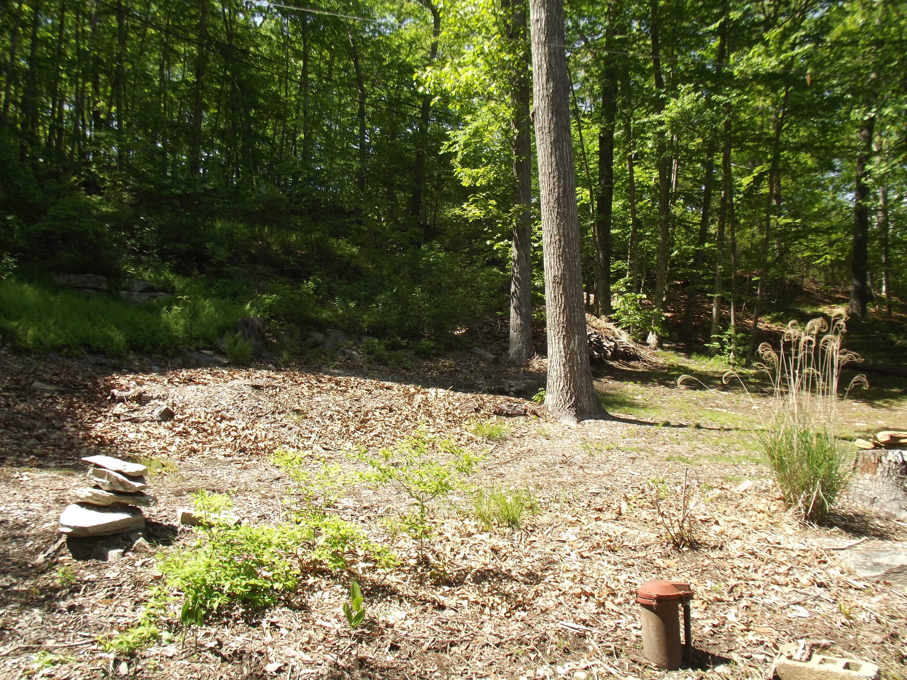 Welcome to the town of East Lyme. This 1.62 acres parcel situated in a rural setting yet close to shopping, the shoreline and major travel routes. Boundary markers in place. Sale contingent upon East Lyme Planning & Zoning Site Plan approval.