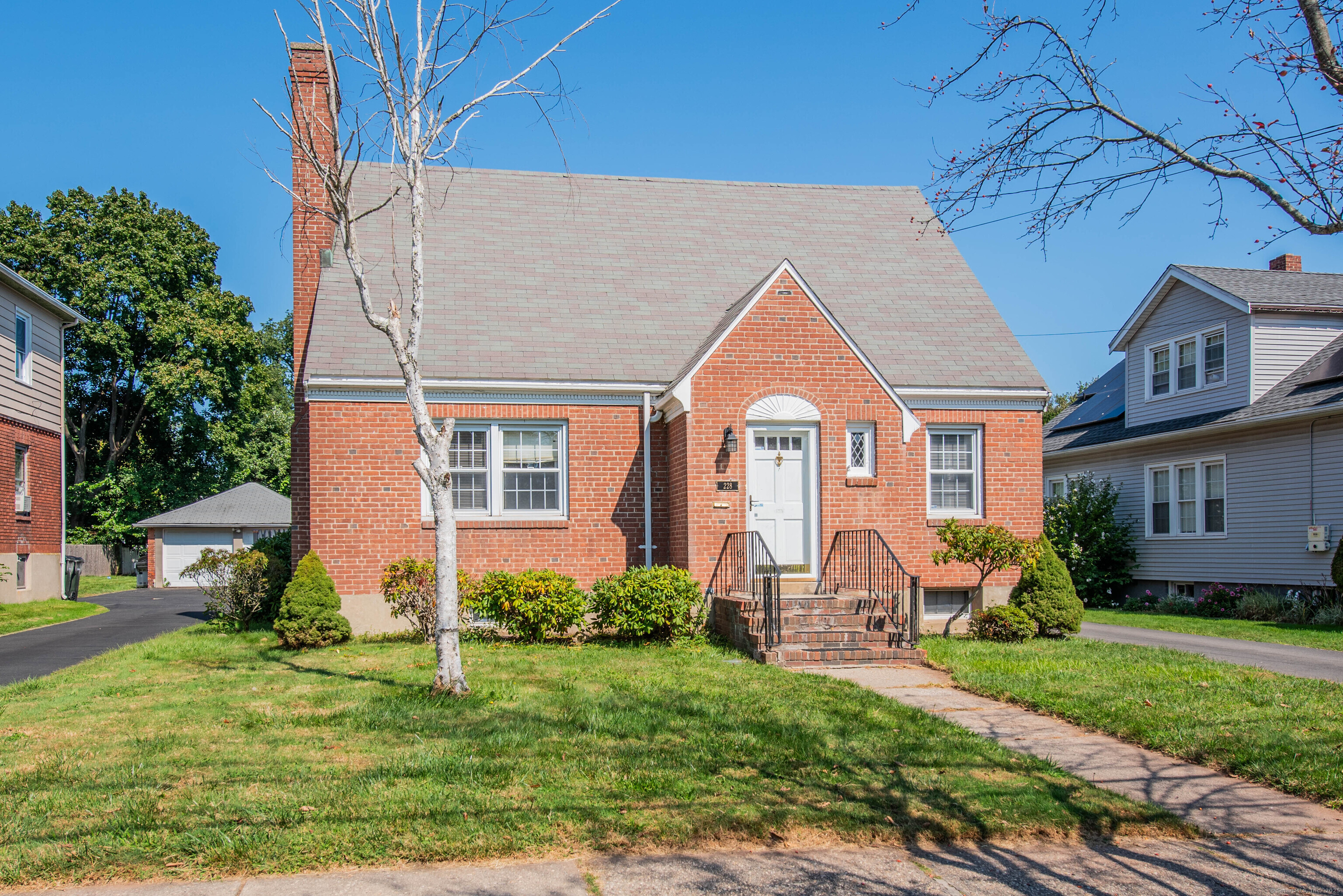 Welcome home to 228 Nott Street, situated in the highly sought-after, quintessential, Historic town of Wethersfield, CT. This Charming, Brick, Cape Style Home was custom built and has only ever had 2 Owners! This home has 3 Bedrooms, 2 Full Baths and boasts over 2, 300 sq ft of living space!! This oversized Cape is filled with tons of natural sunlight, beautifully maintained hardwood floors, specially crafted high quality materials, arched doorways, and lovely crown moldings. The light and bright kitchen features plenty of counter space and cabinetry, with a coffee bar and convenient eat-in area! Enjoy snug, relaxing nights by the wood burning fireplace and binge all of your favorite movies/streaming in the cozy, restful, living room. As we head upstairs, all 3 Bedrooms are generously sized and have hardwood floors throughout. Downstairs you will find a partially finished LL with BRAND NEW Wood vinyl plank flooring and an additional family room with another wood burning fireplace. If you enjoy entertaining a crowd, the formal dining room makes for a great space to enjoy dinners and evening cocktails with your loved ones. Looking to enjoy some time outdoors? During the warmer months you can sit and relax by the refreshing in-ground pool in your private, level, fenced-in backyard and enjoy restful nights by the fire, The possibilities are endless! Conveniently located close to schools, parks, playgrounds, local shops & much more!! DO NOT MISS THIS ONE!! Schedule your tour today!