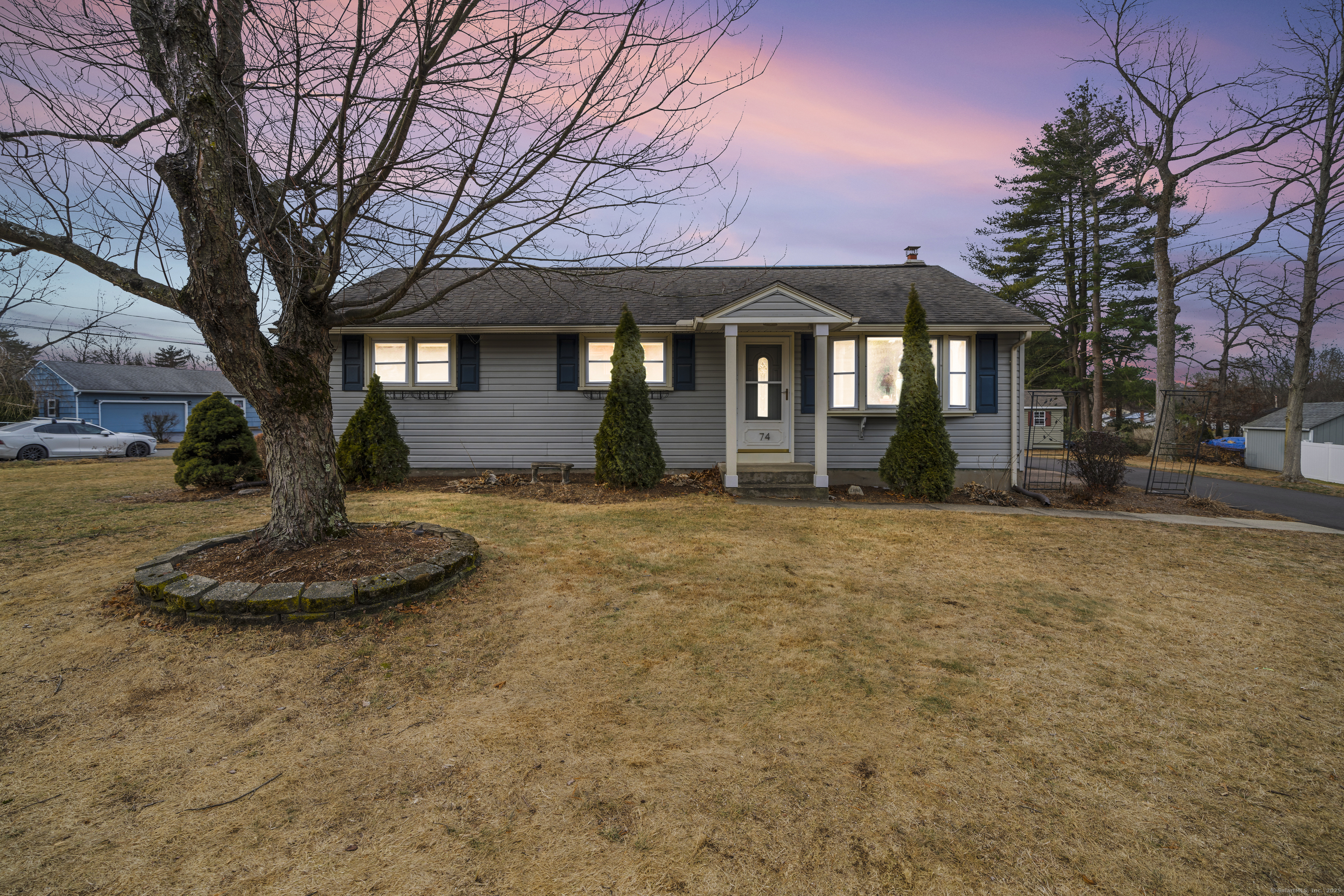 Welcome to 74 Raffia Road, a charming and well-maintained home located in the heart of Enfield, CT. This inviting property features 3 spacious bedrooms, 1 bath, and a functional layout that is perfect for both daily living and entertaining. Upon entry, you'll be greeted by a bright and airy living room that flows seamlessly into the dining area, making it ideal for hosting guests or enjoying quiet family time. The kitchen is well-appointed with ample cabinetry, counter space, and modern appliances. Three bedrooms all on the same floor offering plenty of closet space and natural light. The full bathroom is tastefully updated. There is over 340 additional finished space downstairs. Outside, the large, flat backyard is a true highlight, providing plenty of room for outdoor activities, gardening, or simply relaxing.  Additional features include a great corner lot with new U shaped driveway, raised bed gardens and a shed and professional landscaping. Location in a quiet, family-friendly neighborhood that is just a short drive from local schools, parks, and shopping. New Furnace in 2018, New Driveway 2024 and Chimney done in 2022. Move in ready! Don't miss the opportunity to make this delightful home yours.