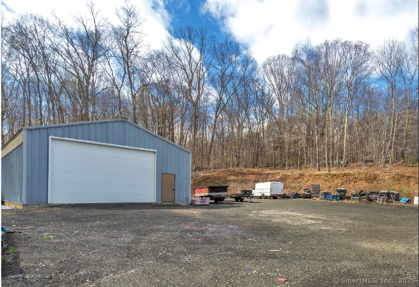 8 Route 80, Killingworth, CT - Building 5 Prime opportunity to lease a free-standing metal building offering versatile use and exceptional accessibility! Spanning 1, 740 sq. ft. with dimensions of 29' wide x 59.5' deep, this property features a spacious layout and excellent functionality. Highlights include: Oversized overhead door: 20.5' wide x 11.5' high, ideal for large vehicles or equipment access. Second overhead door: 7.8' wide x 7.8' high for additional entry options. Man door: 36 for convenient pedestrian access. Ceiling height of 11'6, perfect for various storage or operational needs. Durable metal construction in a non-heated space. Located just off Route 80, this property provides excellent visibility and easy access to major routes. Whether you need storage, workshop space, or a staging area, this building offers flexibility for your business or personal needs.