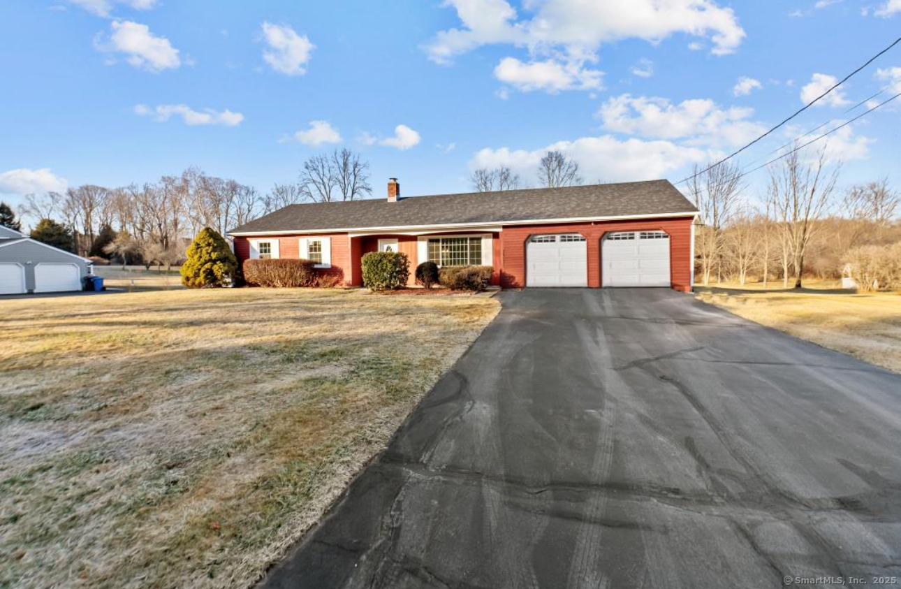 Loved for 40 years, this inviting single-level Ranch home just became available in a quiet Wallingford East Side neighborhood. With 3 bedrooms and 2 full baths, this home features comfortable living space with the practicality of the 2-car attached garage and the convenience of an eat-in kitchen, perfect for everyday meals and gatherings. This home also boasts several recent upgrades, ensuring peace of mind. A new roof and gutters in 2024, newerer furnace 6 years old, new garage overhead doors which have just been installed this month. Additionally, newer carpet throughout the home and freshly painted interior, making every room inviting and ready for your personal touch. The newer windows and front door with oval window enhance the home's curb appeal while flooding the interior with bright, natural light. These features not only add value but also make the home more inviting and energy-efficient, The level .95 Acre lot is ready for you to create your own private outdoor sanctuary, whether that means a garden, a play area or room for expansion. Nestled among other fine homes on a non thru street, this property invites you to a quiet setting with easy access to local amenities. A must see!