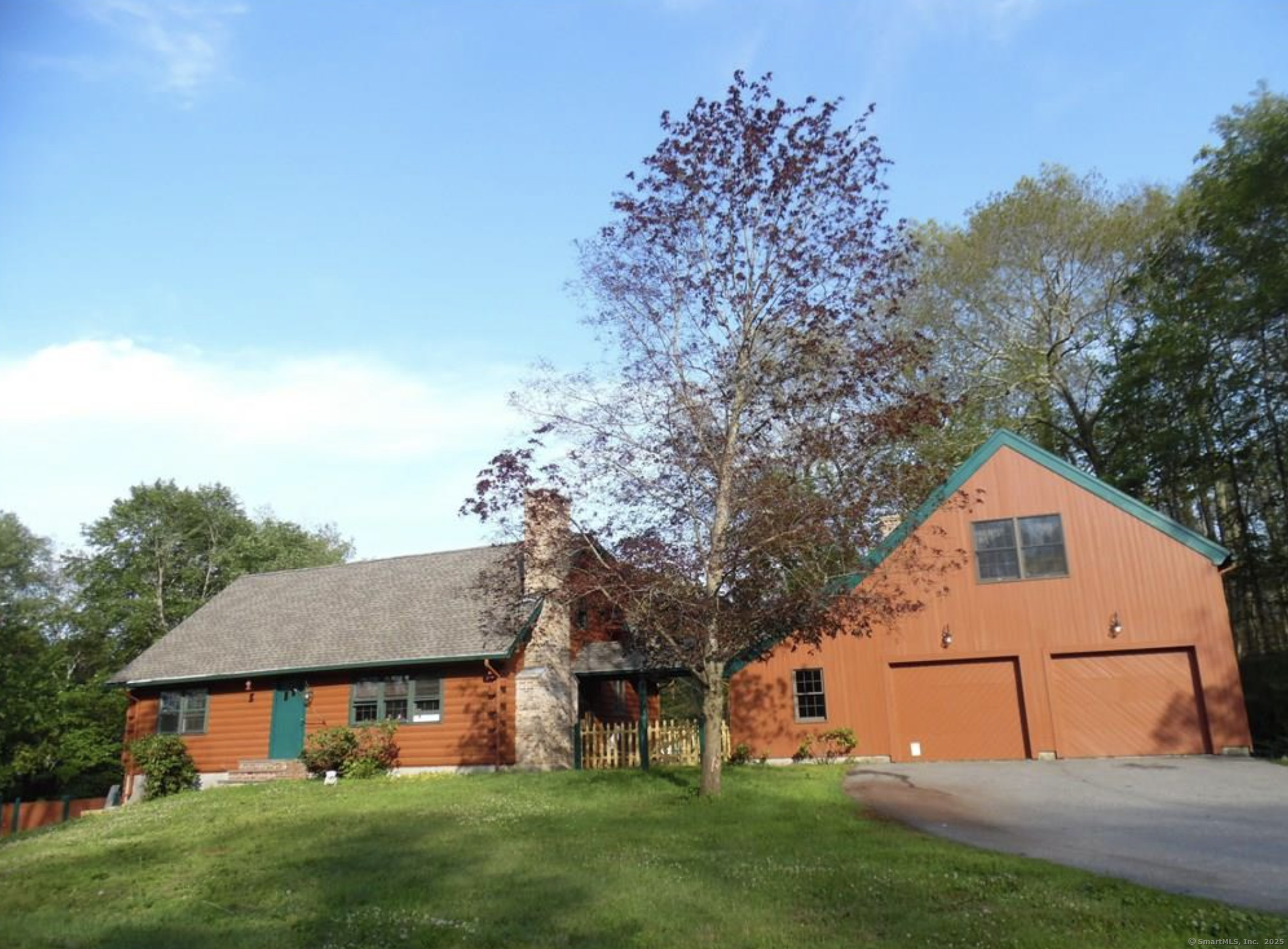 WOW! 26 x 26 HEATED 2 car garage w/ 20 x 20 STUDIO above w/ full bathroom, WOOD flooring and VAULTED ceiling. ONE of a kind cape w/ FULLY FINISHED LOWER-LEVEL w/ kitchen, full bathroom, LARGE Livingroom leading out to FARMERS porch, 1 bedroom, den and another finished room! HUGE VAULTED wood ceiling w/ EXPOSED BEAMS in living room w/ BRIGHT NATURAL light coming through open floor plan w/ dining area and kitchen w/ large island. Full bathroom, large bedroom and FIREPLACE family room w/ VAULTED ceiling, EXPOSED beams and wood floors. WOOD Stairs lead to primary bedroom w/ wall to wall closets and SKYLIGHT w/ full bathroom w/ shower OPEN BALCONY perfect for office w/ SKYLIGHT. OPEN SHED CONVEYS, 2016 ROOF, ***$5000 CREDIT for some windows that have lost the seal and 1 kitchen window and counter top in lower level***