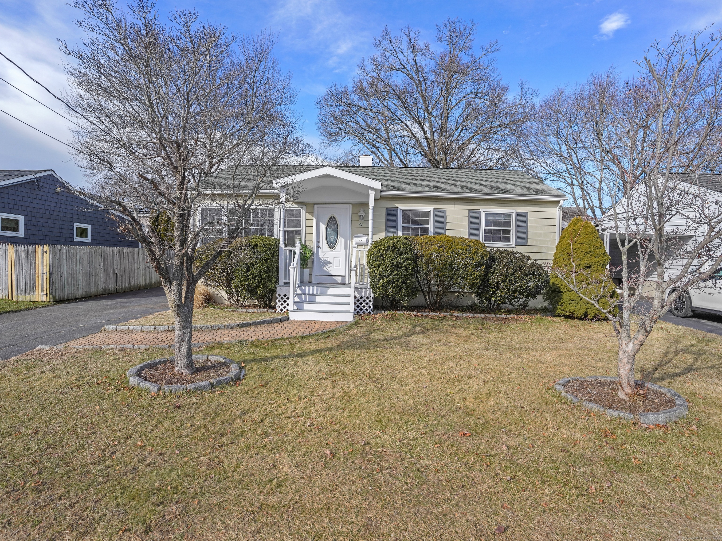 This chic and sophisticated ranch-style home is perfectly located in a sought after Fairfield neighborhood. Offering 3 bedrooms and 2 full baths, it provides seamless single floor living with an abundance of natural light streaming through every space. The inviting living room, complete with built-ins, flows effortlessly into the elegant dining room, perfect for entertaining. The spacious eat-in kitchen features a new GE stainless steel refrigerator, a stainless-steel dishwasher and oven, along with direct access to the back deck. The deck provides ample space for seating and dining making it ideal for gatherings. The main floor primary suite is a tranquil retreat with an ensuite full bath, cozy window seat and large custom closets. It also offers direct access to the back deck, perfect for enjoying a peaceful morning coffee. Two additional bedrooms and a full bath complete the main level. The partially finished lower level, currently used as a playroom, adds versatile space to the home. The property is fully fenced offering privacy, and is perfect for dogs. Freshly painted both inside and out. Convenient to everything! This meticulously maintained home is ready to move in and enjoy.