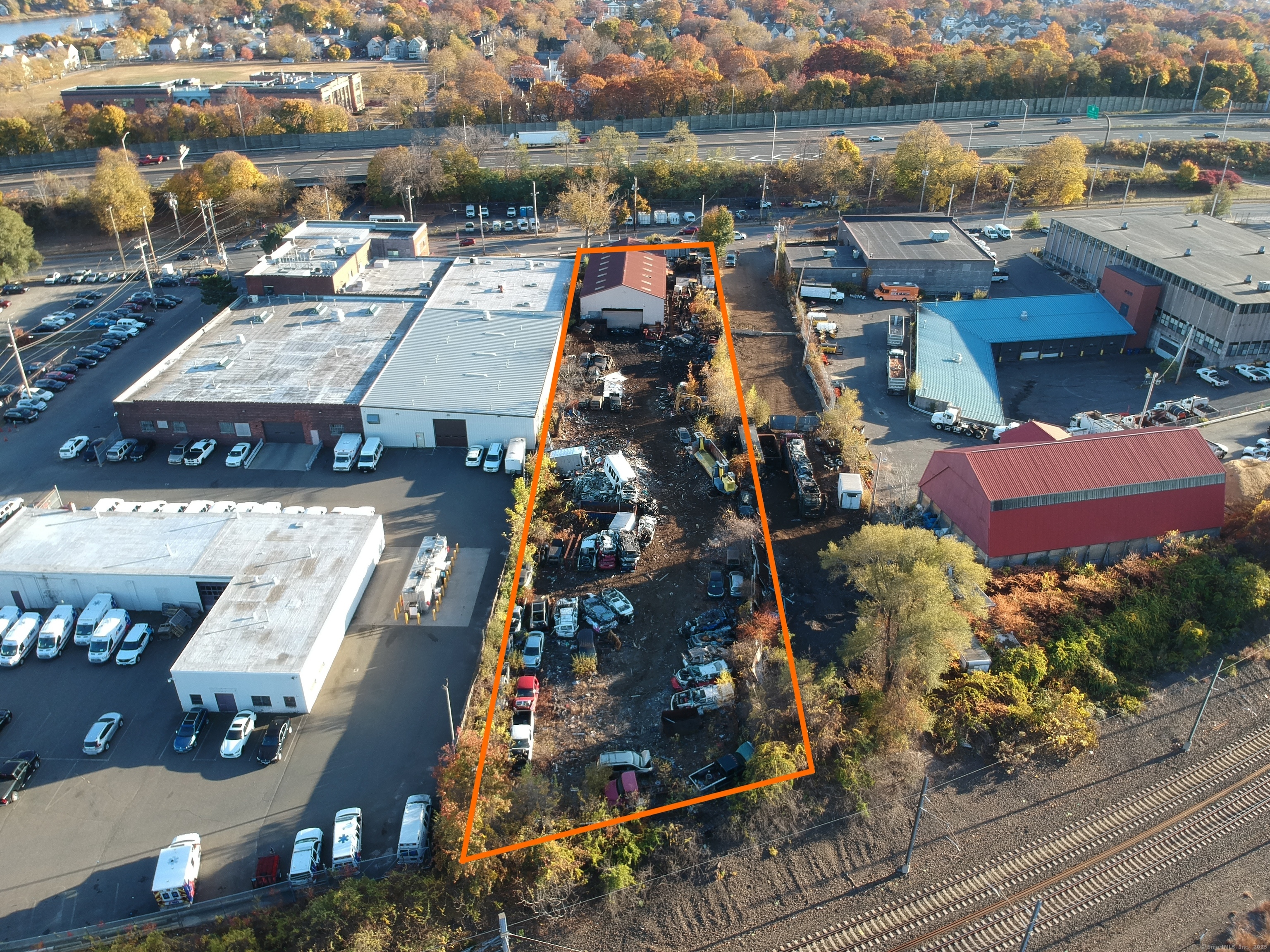 Great Business Opportunity in New Haven! This sale includes the 1 acre parcel, buildings, parts/scrap business, parts inventory, business license, machinery, and a tenant in a separate additional building. Included in equipment are three loaders, a crusher, excavator, tractor trailer, fork truck. Main building is 4, 600 sf. Second building is an 800 sf restaurant with lease. The property also has access to a rail spur. Easy access to I-91.