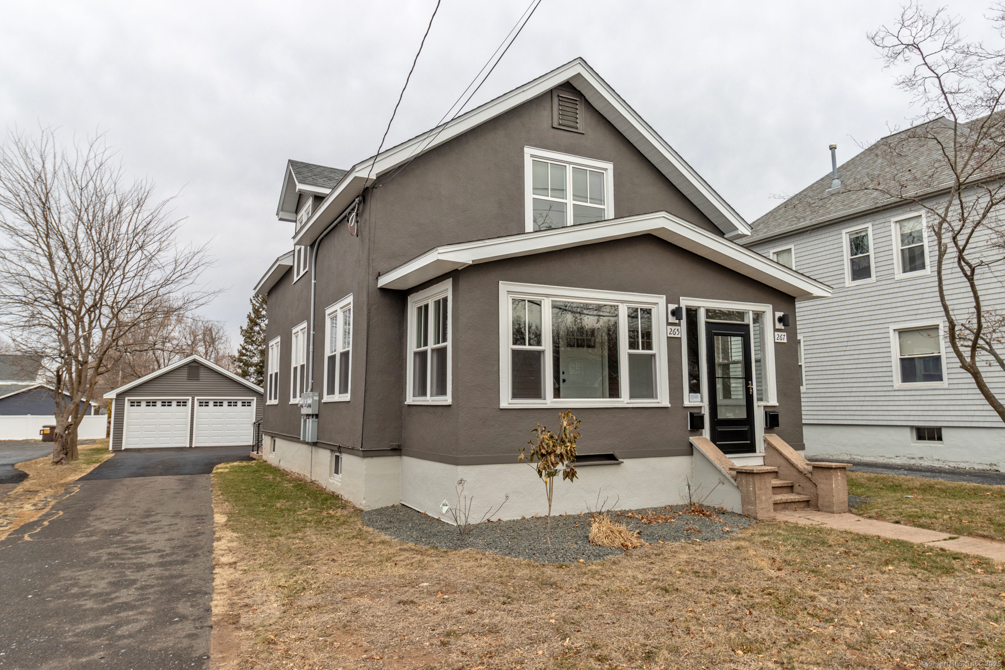 **Beautifully Renovated Rental in the Heart of Glastonbury!** Experience modern living at its finest with this fully renovated first floor unit, ideally located just steps from downtown Glastonbury. Enjoy the convenience of being within walking distance to fantastic dining, shopping, grocery stores, and all the amenities this vibrant town center has to offer. This stunning property has been completely remodeled from top to bottom, featuring a brand-new kitchen with sleek, modern finishes, a fully updated bathroom, and contemporary flooring throughout. The electrical systems have been upgraded, and new heating and air conditioning units ensure year-round comfort. An on-demand hot water tank provides energy-efficient convenience. The property includes one parking spot in the two-car garage, complete with a remote opener, as well as an additional parking space in the private lot. A minimum one-year lease is required, and tenants must meet the following criteria: no smoking, credit check, background check, eviction check, and landlord interview. At lease signing, two months' security deposit and the first month's rent are due. Don't miss the opportunity to call this beautifully upgraded first floor unit yours-schedule a showing today!