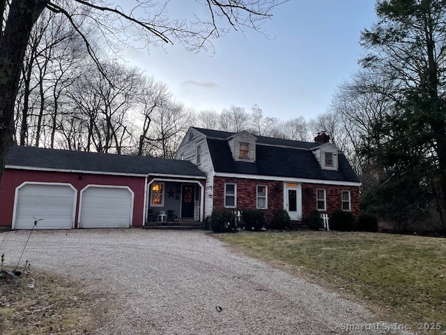 Bring your creative energy and make this 3 bedroom 1 and a half bath gambrel colonial your special home. The house needs renovation but has good bones and the 10 acre lot is flat and useable! There is a large kitchen open to the dining room. Take a step down to the front to back living room with a brick fireplace. There is a half bath on the main level as well as a laundry room. Upstairs are 3 bedrooms and a full bath. There is definitely an upside here for a builder, investor or homeowner who does not mind doing some work. Being Sold AS IS! Will not qualify for FHA financing