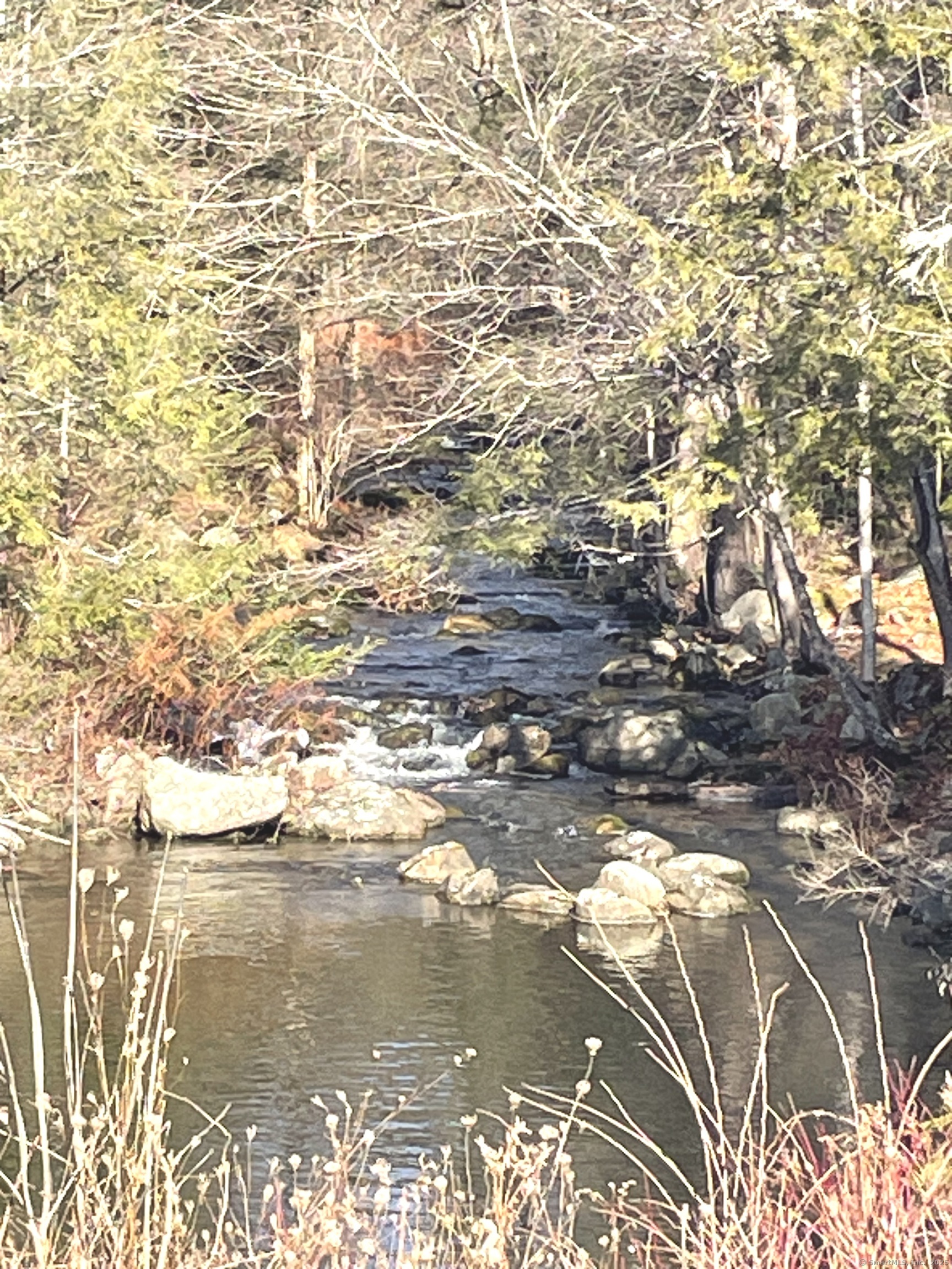 Lot #236 in Canterbury Ct. Unique opportunity to build your home on the Marshapaug River and still enjoy all of the amenities of the Woodridge Lake community. Boating, swimming, clubhouse with health club, and lodge. Tennis courts, pool and 4 beaches to access the pristine lake. Architectural drawings of proposed house included.