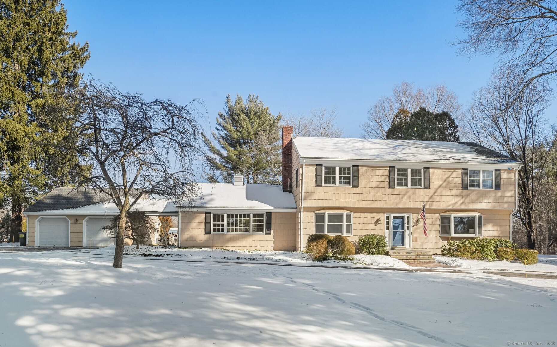 Stunning N Stamford Col with Expansive Yard and Modern Comforts. This Col home welcomes you w/ an open floor plan that combines practicality w/ modern touches. Spacious, sun-filled GR opens to the updated KIT feat. Thermador appl, an ilnd with brkfst bar, plenty of granite cntr space & Sliders to Deck. The DR w/ Fireplace provides the perfect venue for hosting special occasions. Fabulous FR with Vltd Ceiling, Skylights, Wet Bar, Fireplace, Sliders to Patio and access to the breezeway leading to the Garage offers a comfortable setting for everyday living. Conveniently located Laundry Closet and Powder Room complete the main level. Upstairs, the Primary BR features a W-in Closet and Primary Bath with a dbl vanity and a w-in shower. Three additional BRs and a Full Hall Bath offer ample space for family and guests. The LL includes a partially finished area, ready to be customized for your needs-whether it's a home office, gym, or playroom, full of possibilities, with ample storage space. A 2-car Detached Garage, connected to the home by a Breezeway offers additional storage. Situated on a corner lot, the expansive, level yard is perfect for outdoor living and entertaining, featuring a cozy Firepit for gathering on cool evenings and a Hot Tub for unwinding after a long day. Freshly painted inside & out, gleaming HDWD Flrs run throughout, w/ 2nd Flr & stairs recently refinished, this Col is a perfect blend of charm, functionality & outdoor appeal, ready to welcome you home.