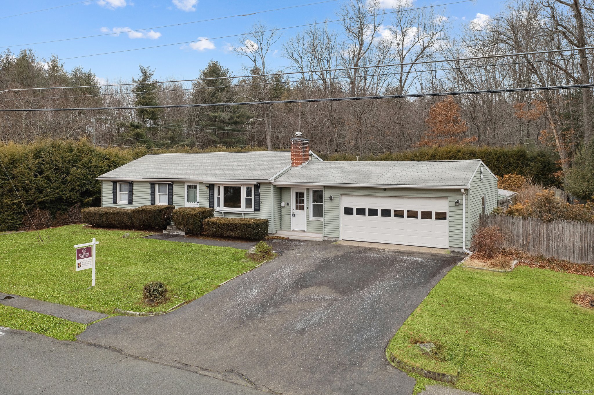 As soon as you pull up to this recently renovated gem, you'll know you've found your dream home! This stunning ranch-style residence boasts an inviting open floor plan and thoughtfully designed upgrades throughout. The updated kitchen is a showstopper, seamlessly flowing into the family room, which features a cozy wood-burning fireplace-perfect for gatherings. With three generously sized bedrooms, a spacious full bathroom, and beautifully refinished hardwood floors throughout, this home exudes charm and warmth. Elegant touches like wainscoting, high ceilings, and a modern mini-split cooling system enhance its appeal. The front-to-back breezeway provides additional functional space, while the oversized two-car attached garage offers convenience and storage. The lower level, complete with a half bath, presents endless potential for customization to suit your needs. Situated on a sprawling 0.53-acre lot, the private, flat backyard is an oasis for relaxation and outdoor enjoyment.This gorgeous one-level home truly has it all-style, space, and convenience. Don't miss this incredible opportunity to make it yours!