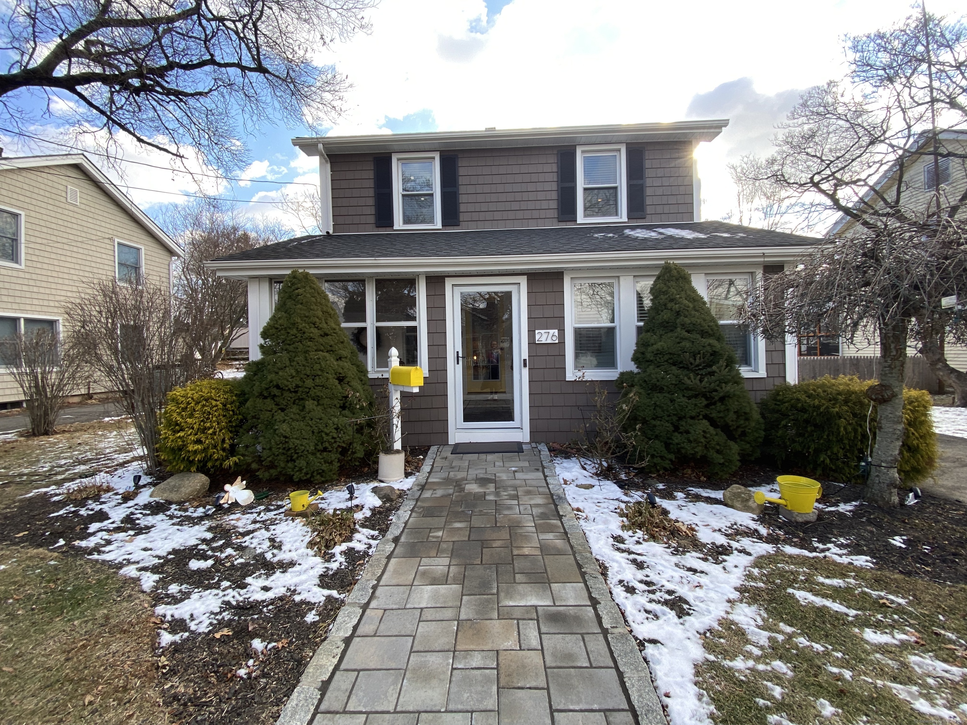 Welcome to 276 Patterson Ave! This colonial home is filled with all of the character, charm & great bones of a home built in 1928 yet it has all of the modern updates that today's buyers demand. As you enter the front 3-season porch with shiplap walls you'll imagine a steaming cup of coffee in hand while setting up your day or a glass of wine as a Spring day sunsets. There is a ceiling fan to keep you comfortable. Then, voila! As you enter the house with gorgeous original hardwood flooring (almost everywhere throughout the home), you are in the comfortable living room with wide doorway into the eating area of the new kitchen! You've got cabinets to the ceiling, honed corian countertops, stainless appliances including a gas range and brand new dishwasher and microwave. The subway tile backsplash and under cabinet lighting complete the room. A barn door to the lower level makes this kitchen perfect! There is a slider to the flat rear yard with custom brick patio which is wonderful for entertaining. The new shed stays with the home. There is a 1/2 bath and office that complete the first floor. As you head upstairs to the bedrooms, you'll see a generous updated full bathroom. Three bedrooms all with hardwood flooring & ceiling fans are on this floor. The lower level is where the laundry is located along with a ton of storage. Living close to Longbrook Park & all that Paradise Green offers, plus the convenience of being near I95, the train, dining & shopping is simply wonderful.