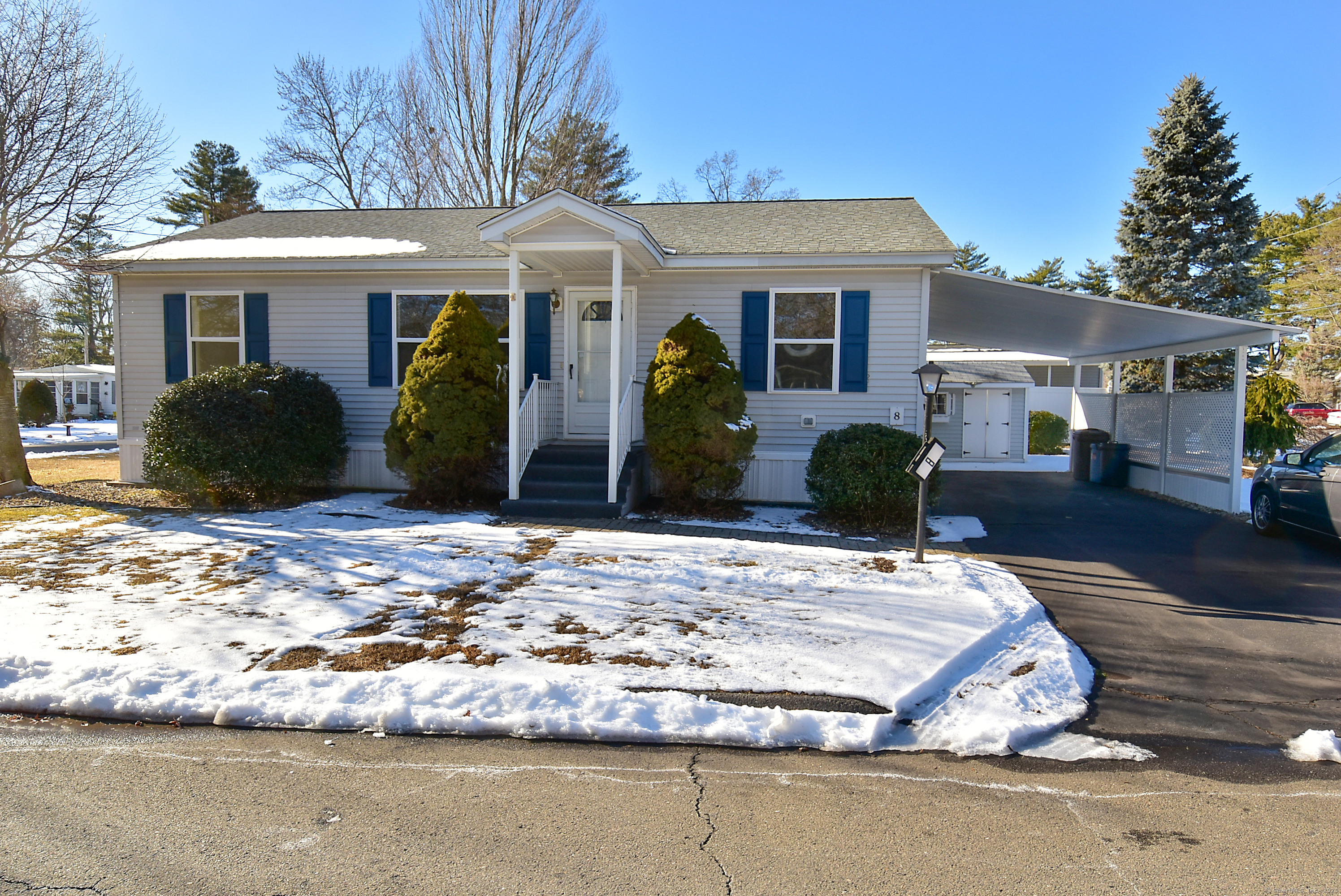 Wow! Rarely Available 2 br 2 ba mobile home in Oak Grove 55+ Community off Shuttlemeadow Road! Boasts neutral decor, sparkling sun-lit rooms, newer carpet, dining space with storage, mudroom w/washer/dryer and a spacious rear porch perfect to curl up with a good book or play a great game of cards! Ample Carport and Storage Shed. Level Community perfect for walking! Nearby Sun Communities offers in ground pool, clubhouse, lots of activities like card games, yoga, fitness and so much more! Garbage, water, sewer and bulk pickup covered in monthly fees! Lease and Application Required for Approval Prior to Purchase! Minutes away enjoy Plainville Dining Options, Norton Park and Walking Trails! CALL TODAY to take a peek!! You'll love it!!!(Estate Sale/Property Sold AS IS-ask for details)