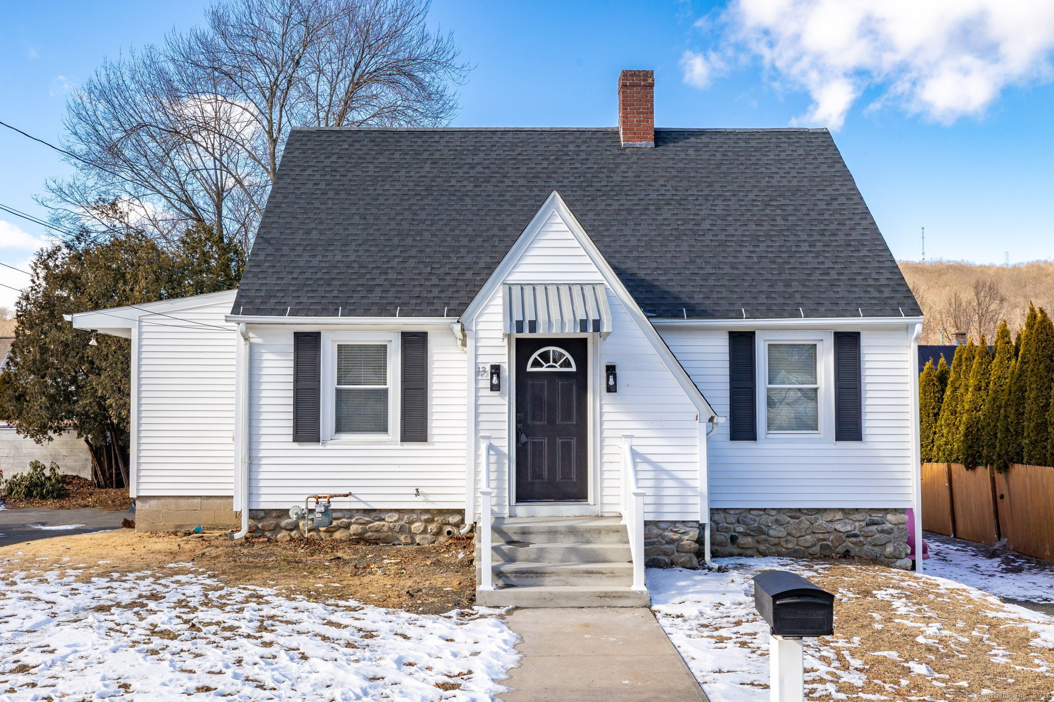 Discover this beautifully remodeled 3-bedroom, 1-bath Cape in Waterbury's desirable East End! This home has been completely updated, featuring a brand-new roof, a stylishly renovated bathroom, fresh paint, and new flooring throughout. Enjoy modern lighting and a sleek kitchen equipped with all-new stainless steel appliances, including a refrigerator, gas stove, microwave, and dishwasher. Upstairs, you'll find two spacious bedrooms, while the main floor offers the flexibility of a third bedroom or home office. The clean, unfinished basement provides excellent storage space. Outside, a flat, partially fenced yard is perfect for relaxation or entertaining. Conveniently located near shopping, dining, and major highways, this move-in-ready home is a must-see!