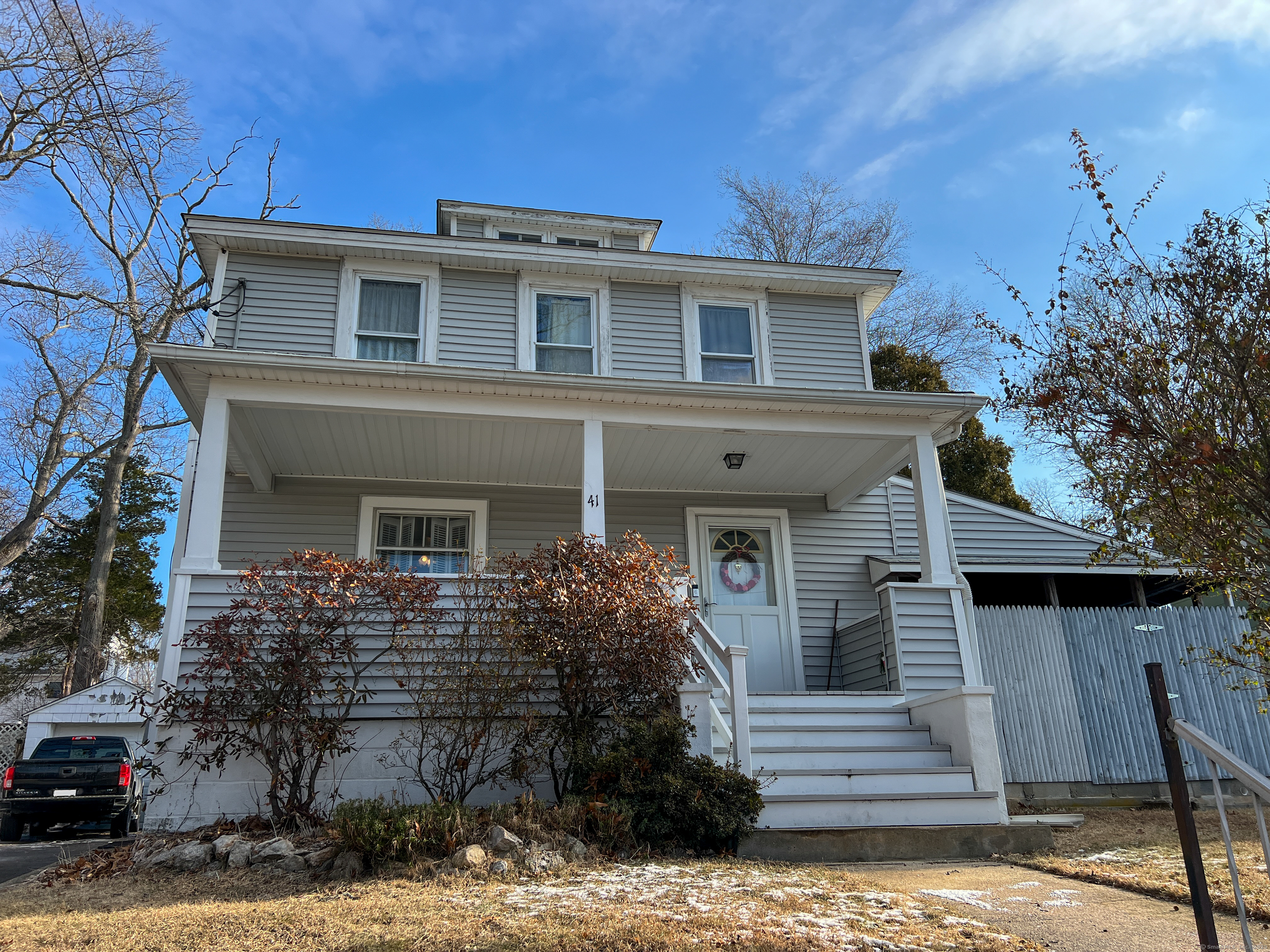 Built in 1920, this 3-bedroom, 1.5-bath home has spacious living areas and timeless character. The bright living and dining rooms provide a comfortable flow for everyday living. The private backyard includes a shed in the rear that will remain. The front porch features an overhang for added protection, and there is a fenced-in side addition with a finished roof overhang, providing a covered storage area with airflow. Conveniently located with easy access to I-95 and I-395, just minutes from Electric Boat, Pfizer, local casinos, and a variety of dining and shopping options. Plus, ferry and train connections nearby enhance accessibility.