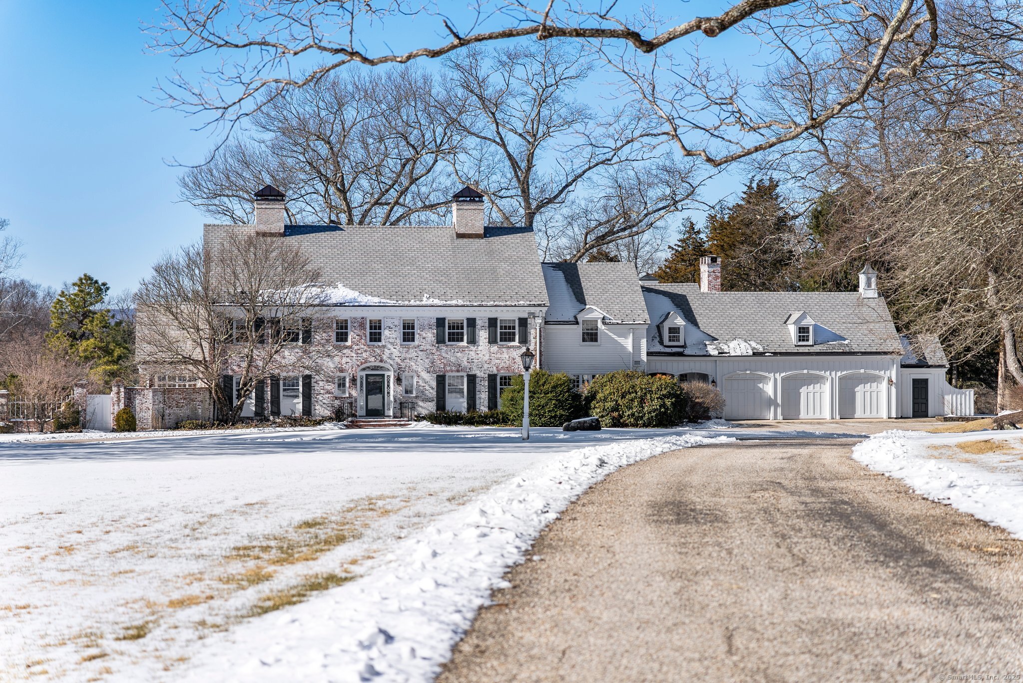 Nestled on prestigious Mountain Spring Road, Partridge Hollow presents a rare opportunity to own a magnificent estate. This white-washed brick Colonial, set amidst 21 acres of lush countryside, offers an unparalleled blend of luxury, privacy, and sophistication. The stately gated entry and graceful circular driveway lead you to this exquisite home. Heated pool and private one-acre pond create a serene oasis. A traditional layout exuding timeless elegance, with 5 fireplaces adding a blend of grandiosity and warmth. The kitchen features a fabulous center island, Viking paneled appliances, and light-filled breakfast nook with pastoral backyard views. Caterer's kitchen equipped with Viking fridge, dual wine coolers, dishwasher, and generous counter space, ensures seamless entertaining. Butler's pantry is an elegant storage solution for your china. Newer Great Room and 1st floor full bath lend more elegance. The Upper Level unfolds generous rooms with a luxurious primary suite, expansive walk-in closet, dressing room, and 2 full baths. Finished 3rd floor is an ideal EnSuite or bonus room. Lower level is an entertainer's dream, featuring billiards room, 3, 000-bottle wine cellar-tasting room, lounge with a curved wood bar, therapeutic sauna and home gym. Coveted location near The Country Club of Farmington, historic Farmington Village, Miss Porter's School, Farmington Polo Grounds, 2 hours to NYC and Boston. This estate is a fine CT legacy ready for you to make lifetime memories.