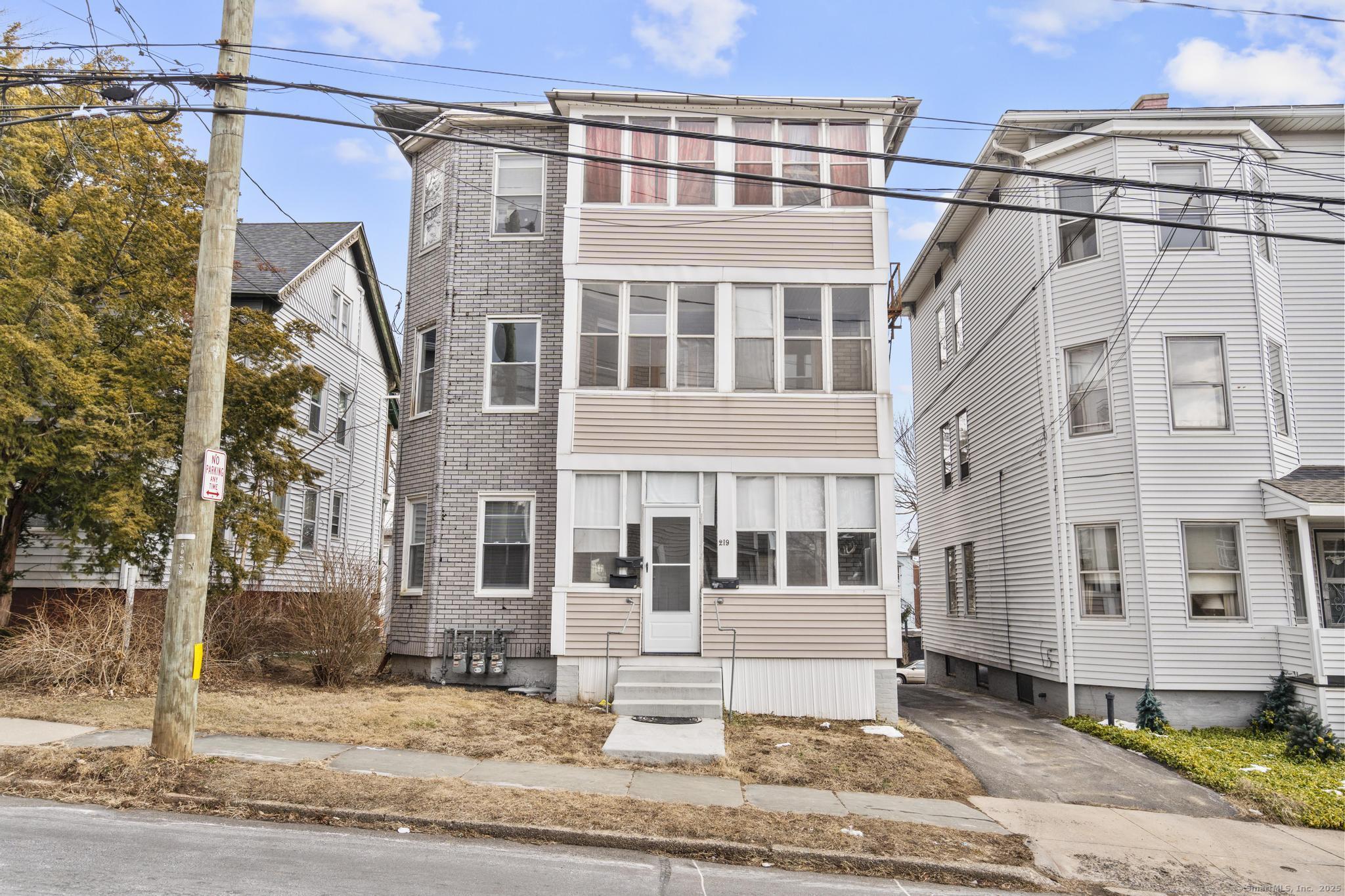 Take advantage of this fantastic opportunity to own a well-kept, 3-unit multi-family property in the appreciating city of New Britain! With 2 units rent-ready, this gem is perfect for investors looking for solid rental income or for those wanting to live affordably while letting tenants help cover mortgage payments. Each spacious unit spans nearly 900 square feet and features two cozy bedrooms, large kitchens, and bright, inviting living rooms. The charming front and back porches add to the property's appeal, and the convenience of in-unit laundry hookups makes it a breeze for tenants. With a newer roof and windows, you can count on long-term efficiency that will help keep maintenance costs down and overall value up. For even more flexibility and rental potential, the first and third-floor units offer gas heating, while the second-floor unit has electric heat and a beautifully renovated bathroom. This smart layout, thoughtful updates, and an unbeatable location just minutes from shopping, public transportation, and everything New Britain has to offer-truly make this property a standout choice. More than just an investment, it's a turnkey property with built-in equity and endless possibilities. Whether you're looking to expand your portfolio or find a self-sustaining home, this is an opportunity you won't want to miss!