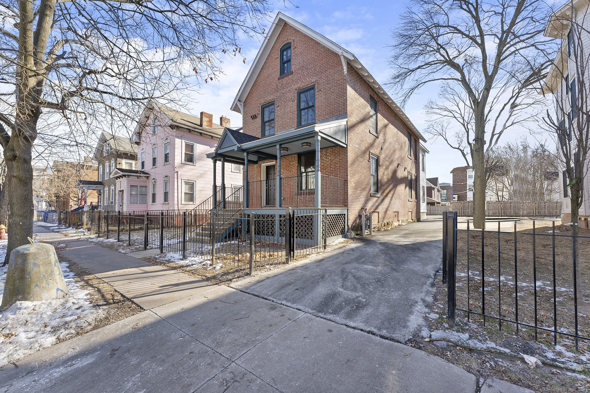 Discover the perfect blend of historic character and contemporary sophistication in this beautifully renovated 2-family home. Each of the spacious units offers 2 bedrooms and 2 bathrooms, featuring bright, open-concept living spaces filled with natural light. Designed for modern living, the sleek kitchens and updated bathrooms are complemented by large, versatile living areas that offer comfort and style for both everyday living and entertaining. New windows allow sunlight to pour in, creating a warm and inviting atmosphere throughout. The property boasts numerous recent updates, including newer vinyl siding, a new roof, and brand-new mechanicals, ensuring worry-free living for years to come. Additionally, a paved driveway and off-street parking provide added convenience. Located in Hartford's vibrant South End, this multi-family home offers great value and the opportunity to benefit from the city's tax deferral program for low taxes. The property must be owner-occupied, making it an ideal choice for those looking to live in one unit while generating income from the other. With its turnkey condition and prime location, this home is a rare find. Don't miss your chance to make this property your own-schedule a viewing today!