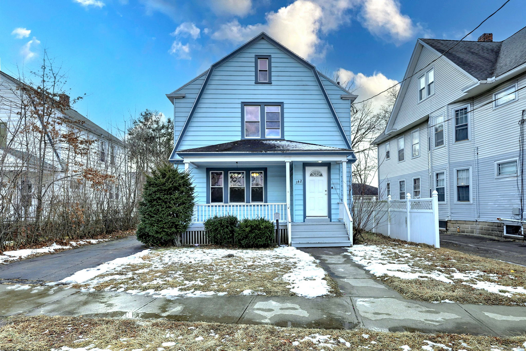 Charming 1930 Colonial with Modern Touches Step into this delightful 3-bedroom, 1.5-bath Colonial, exuding 1930s charm complemented by thoughtful updates. Hardwood floors flow throughout, highlighting the warmth and character of this timeless home. Relax on the inviting rocking chair front porch, perfect for unwinding after a long day. Inside, the living room features a cozy fireplace, ideal for gatherings or quiet evenings. The dining room offers space for entertaining, while the kitchen boasts newer white cabinets, ample counter space, and a practical pantry equipped with a dishwasher, sink, and additional storage. A convenient half bath and an enclosed back porch overlooking the fenced backyard complete the main level. Upstairs, you'll find three comfortable bedrooms and a full bath, offering plenty of room for family, guests, or a home office. Nestled in a residential neighborhood, this home is conveniently located near Southern Connecticut State University and Albertus Magnus College, with easy access to local amenities. This property seamlessly blends vintage charm with modern convenience-don't miss the chance to make it your own!