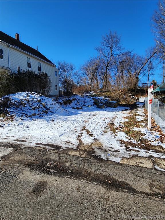 Attention builders and investors! This building lot previously had permits to construct a side-by-side 2-family home with a basement and 2-car garage. Don't miss this opportunity to bring your vision to life! Please conduct your own research and verify with the city regarding the permits originally approved in 2020.