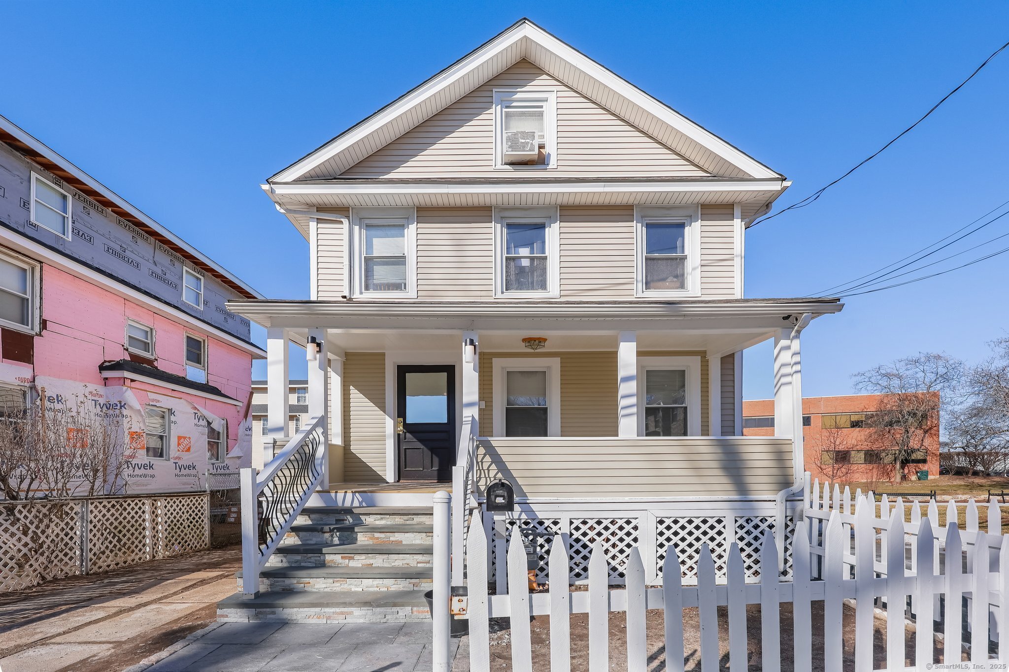 Welcome to this Charming colonial situated close to vibrant downtown SoNo! Upon entry, the main level offers a front foyer which opens to a generous living area with hardwood floors throughout leading to the adjacent formal dining room. The kitchen has been graciously updated with a breakfast bar, stainless-steel appliances, granite countertops and plenty of cabinet storage. A full updated bath, mud room and back porch entryway round out the main floor. Upstairs you'll find three good-sized bedrooms with hardwood floors, and a full bath. The finished attic adds even more possibilities with space that can be used as a 4th bedroom, guest suite, gym or home office. The lower level offers additional space for storage and laundry facilities. The comfortable backyard provides space for additional outdoor enjoyment and entertaining and ample parking provided by a large driveway accommodating up to 4 cars. Perfectly situated near local shops, dining spots, parks and transportation. Schedule your tour today! House being sold as-is.