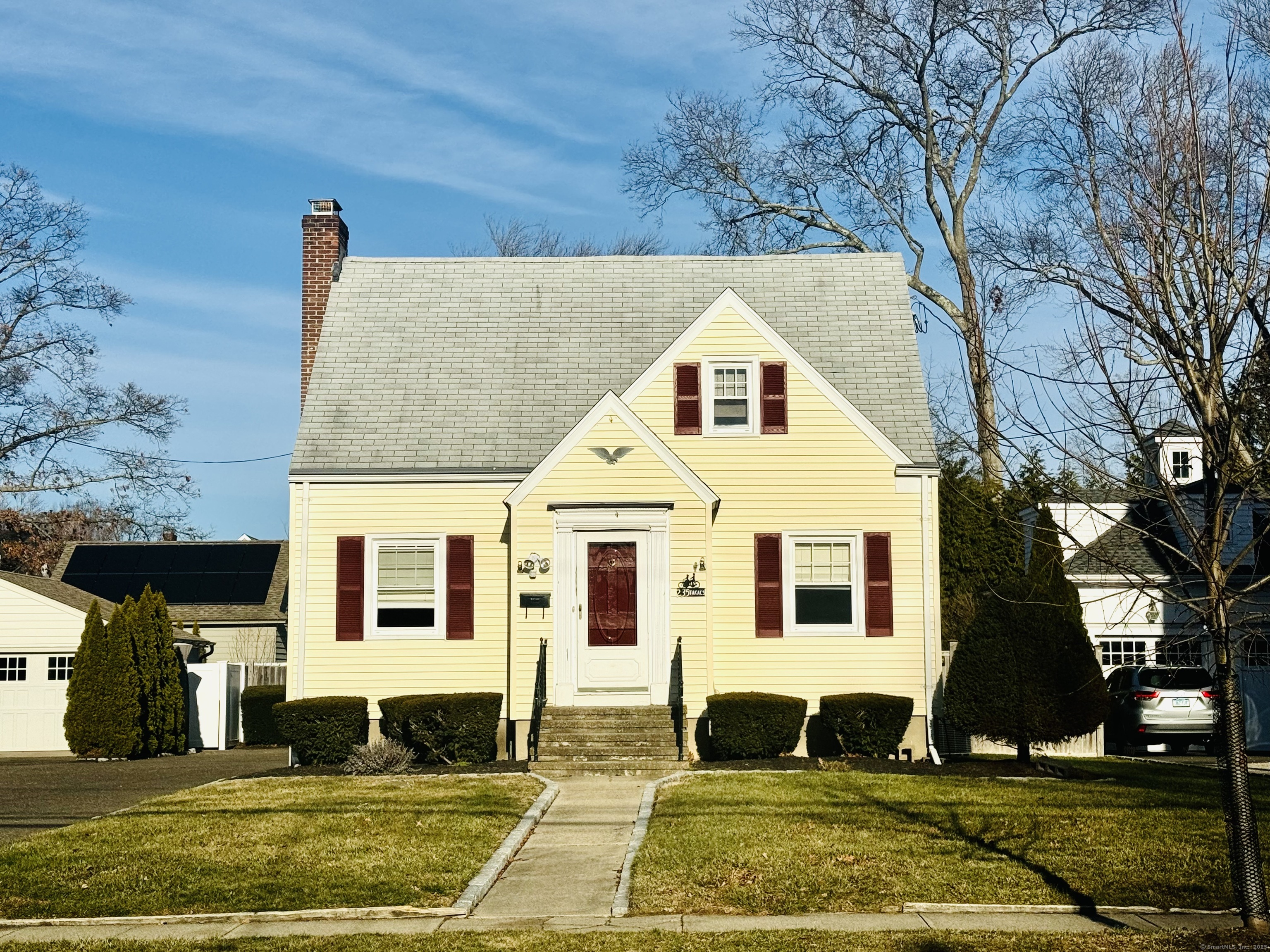 Well maintained family home located on one of the town's most coveted streets. First floor features large living room with fireplace, dining room, kitchen, family room with direct access to composite deck overlooking in ground pool. Partially finished lower level adds to the sq ft. Large two car garage with ample off street parking. Needs minor cosmetic updating