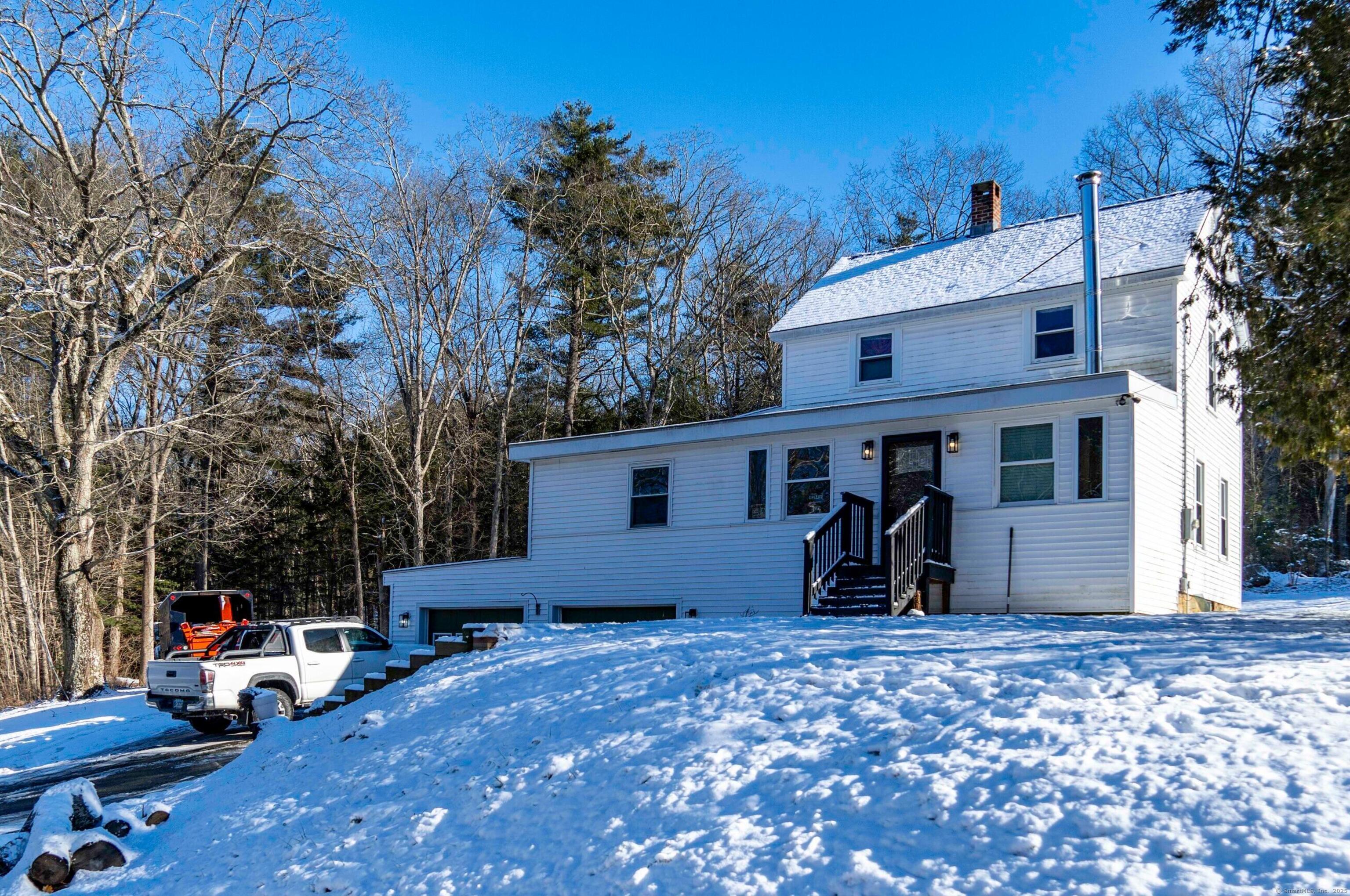 Nestled on a quiet country road just a few miles from downtown, this charming property offers the perfect mix of comfort, character, and modern convenience. Sitting on a spacious 1.66-acre lot, this move-in ready home provides plenty of room to enjoy the outdoors. The attached greenhouse is a perfect space to nurture new beginnings-whether it's plants, hobbies, or fresh ideas. Inside, the beautifully updated kitchen (remodeled in 2024) brings farm-to-table dreams to life, while the spa-like bathroom offers a peaceful retreat with a waterfall showerhead and a fresh, relaxing ambiance. The first floor primary bedroom makes living easy and the extra bedroom on the main level adds even more flexibility, making it ideal for a home office, game room, or guest space. The oversized garage is a dream for anyone who loves to tinker, offering ample space for vehicles, storage, or a workshop. With easy access to town and major highways, this home delivers the best of both worlds-convenience and tranquility. Thoughtfully maintained and upgraded (including new windows in 2015), this North Windham gem is ready to welcome you home. Schedule your showing today!