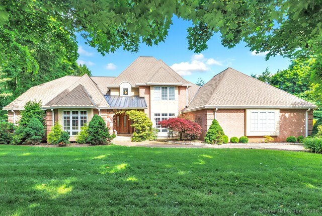 Exterior of 24 Brierwood Dr, Orange with pool and patio