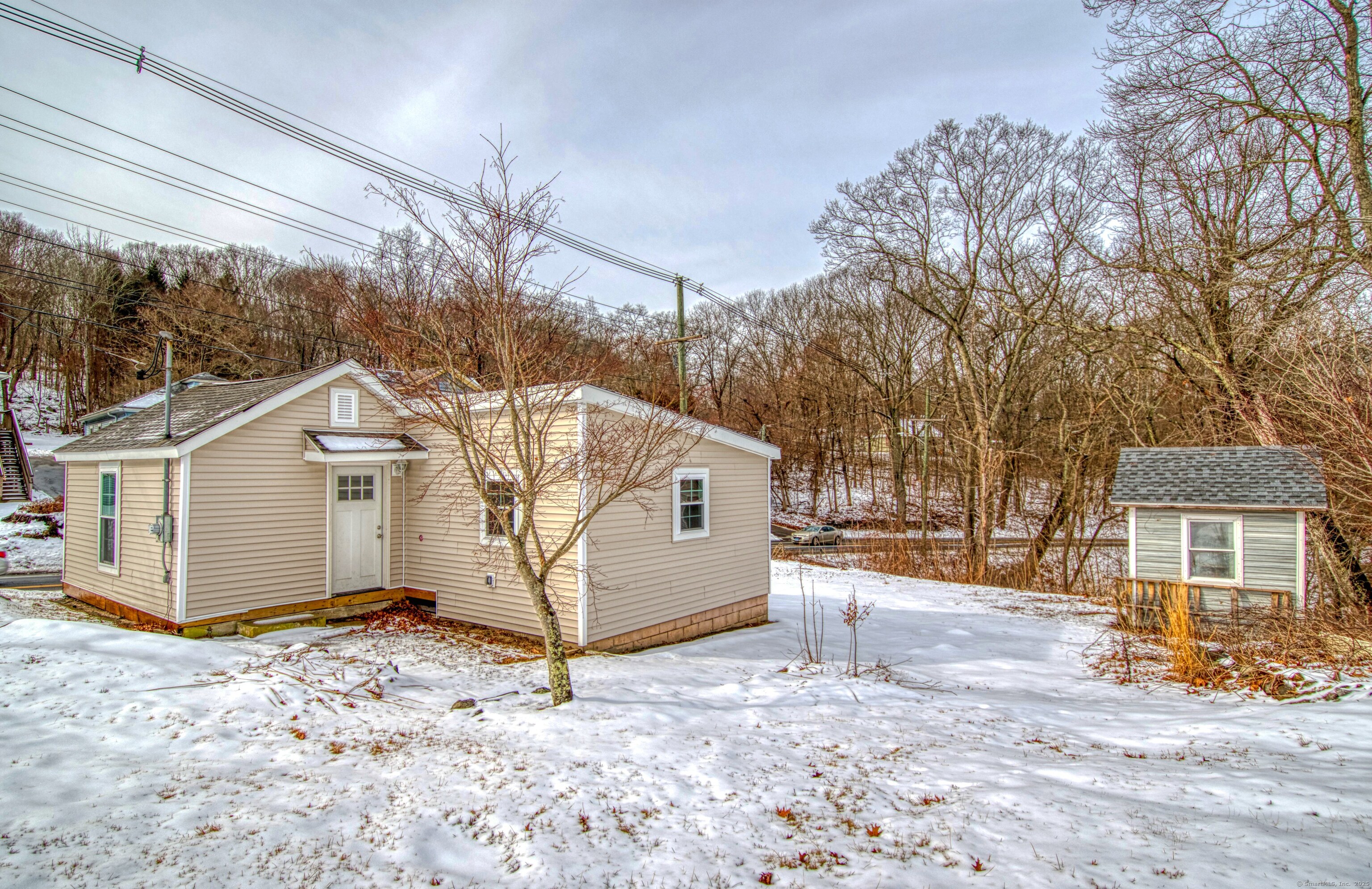 This property overlooks the Shetucket river with sweeping views and direct waterfront. There are two homes on the property, the main house is a 3-4 bedroom with 2 baths that has been completely gutted and ready to be finished. This home can also be converted into a 2 family. The other home is a 1 bedroom cottage that has been completely renovated and only needs a few finishing items. A great investment or multi family opportunity close to highways.