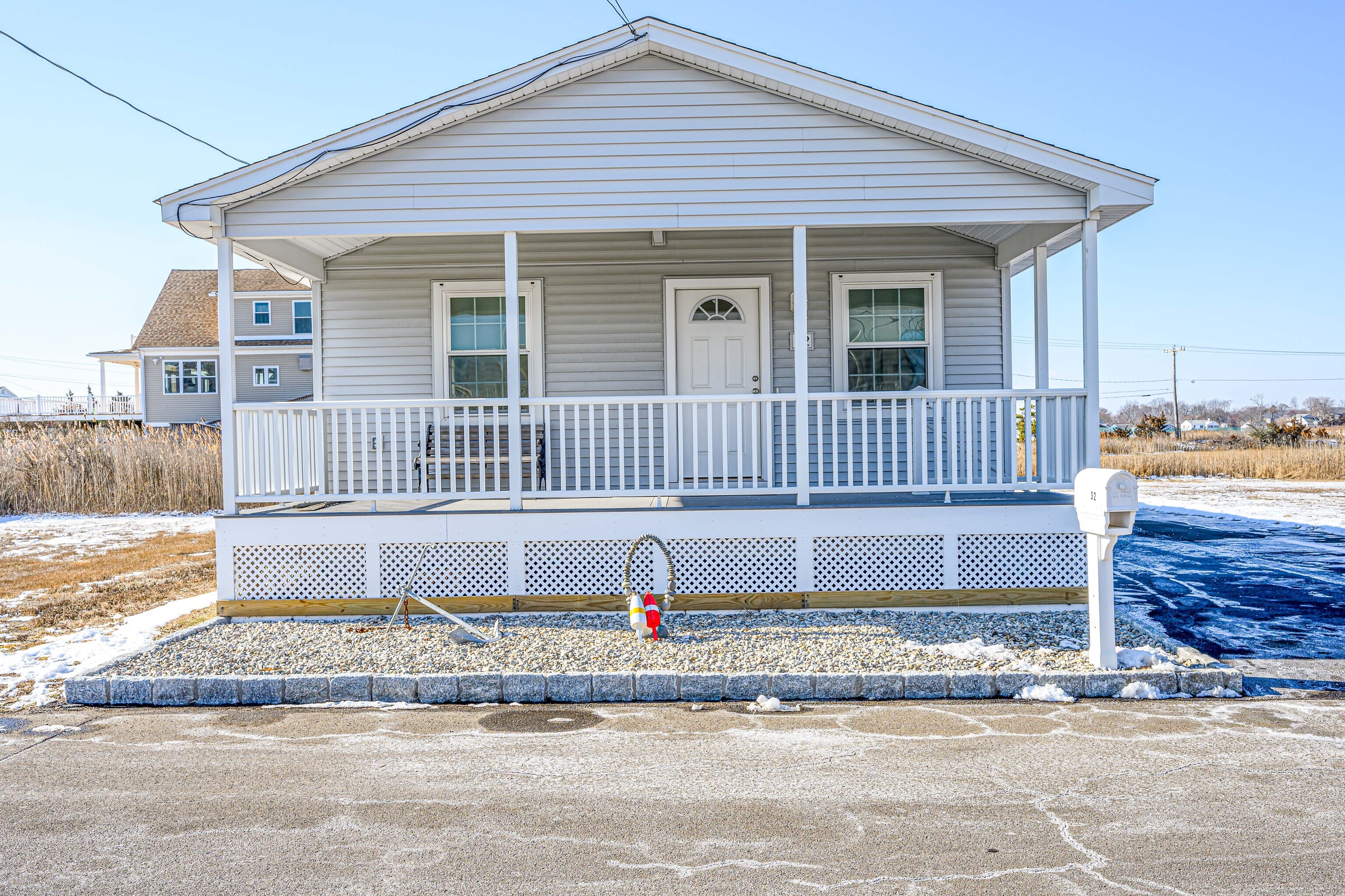 Just in time for Summer! This completely renovated bungalow by the shore of East Haven offers the perfect blend of modern amenities and beachside charm. Just a short distance to the public beach and the Silver Sands Beach Club, you'll enjoy easy access to the sun, sand, and water. Plus, with popular restaurants like the Lobster Shack and Sandpiper nearby, you'll never run out of local dining options! Easy access to highways and downtown New Haven as well.   Boasting a complete gut renovation, this home features a brand-new kitchen with sleek quartz countertops and top-of-the-line GE appliances, perfect for cooking and entertaining. Both full bathrooms have been beautifully updated with tile showers and quartz countertops. The entire home is outfitted with stunning luxury vinyl flooring, providing both style and durability throughout. Everything you need is on one floor for easy living. See attached list of full updates.  Don't miss your chance to own this fully updated gem in East Haven!