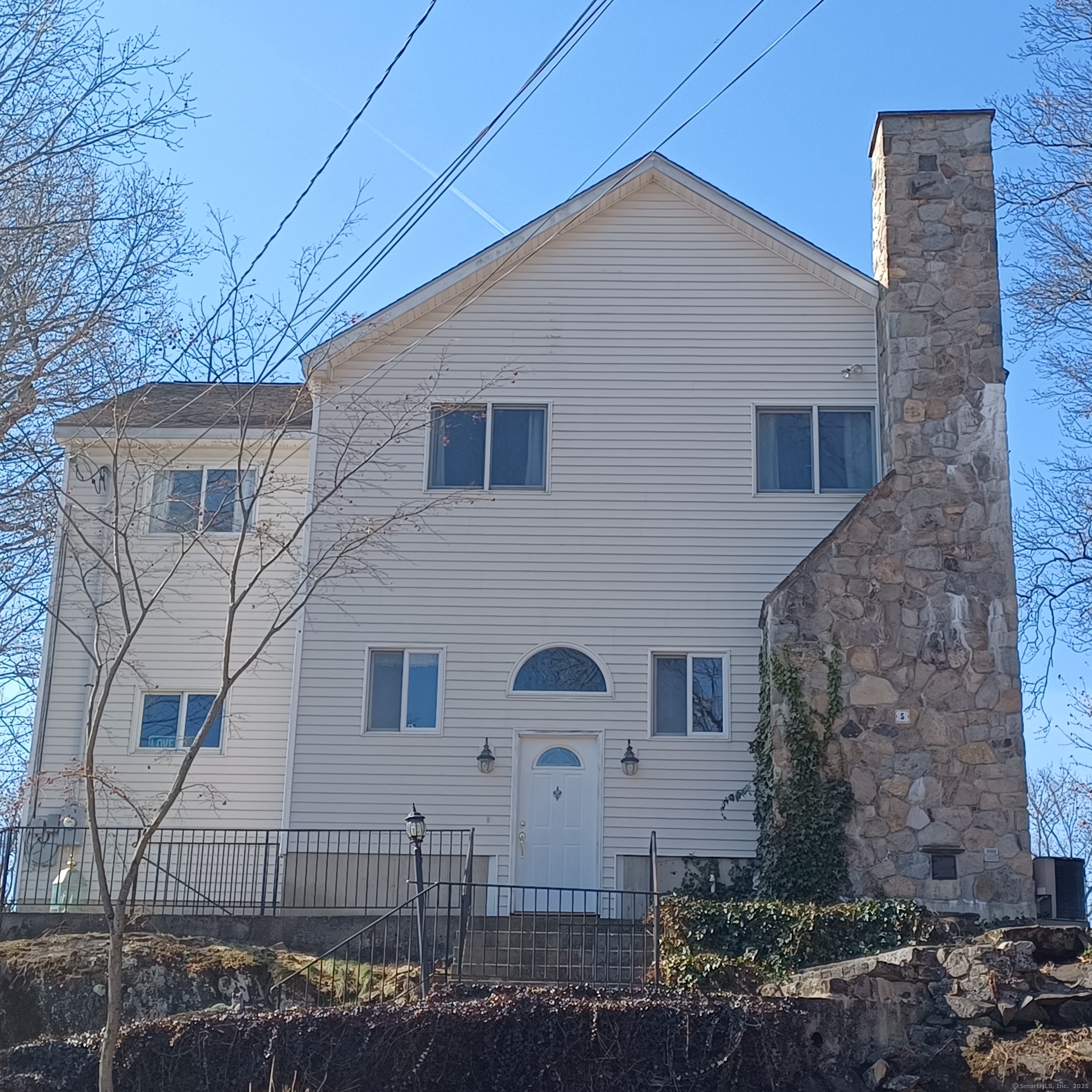 Stunning year-round views of Candlewood Lake. Set the stage for this beautiful 3 bedrooms 2.5 baths custom build colonial. Open floor plan, great for entertaining. Two by six (2 X 6) construction, 9 foot ceilings on main level and 8 foot ceilings on second floor. Fabulous eat-in-kitchen, with lake views, center island, SS appliances, granite counter tops, open to the cozy family room with a field stone fireplace and built-in wood pizza oven. Second floor fixtures includes a large open landing area, master bedroom suite, and a large studio (previously used as a Spa room) with all the necessary wiring in place for one, and sliders to the balcony with Lake Views. Whole house fan. Heated garage and partially heated driveway. Outside monitors cameras. This property also includes a separated adjacent Lot, 4 Hy-lo Dr. Parcel #78144 - 0.27 of an Acre - Tax $214.00. This beautiful property can be yours just in time to watch the 4th of July fireworks!