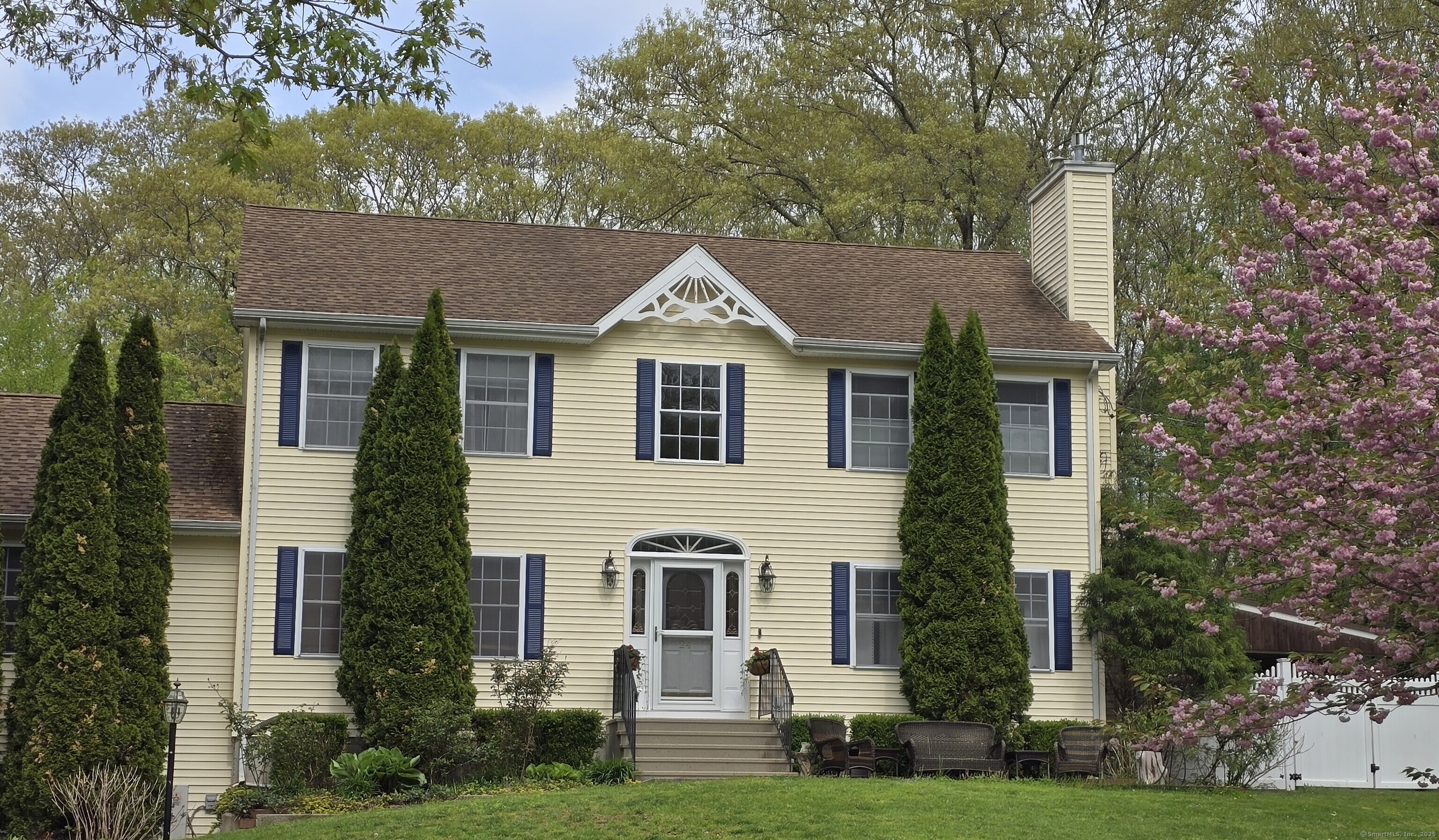 This property is the epitome of charm and modern comfort-truly a place to fall in love with! From the moment you step through the front door, you're greeted by a cozy living room featuring a propane log fireplace, perfect for those chilly New England nights. It's the kind of space that instantly feels like home. The kitchen and dining area, seamlessly open to the great room, create an inviting flow that's ideal for both everyday living and entertaining. And let's talk about that natural light-those first-floor windows flood the space with warmth and brightness, making every corner feel alive and welcoming. Now, the second floor? That's where the magic continues. The primary bedroom suite is nothing short of a dream come true, complete with a full dressing room and closet that feels like your own private boutique. Add in two additional bedrooms and a full bath, and you've got a layout that's as functional as it is beautiful. But wait, there's more! Step outside and you're greeted by a stainless steel outdoor kitchen-perfect for summer barbecues and al fresco dining. The perfect home for all!
