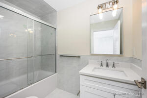 This bathroom has a tub / shower.