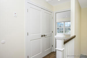 The laundry closet is on the bedroom level.