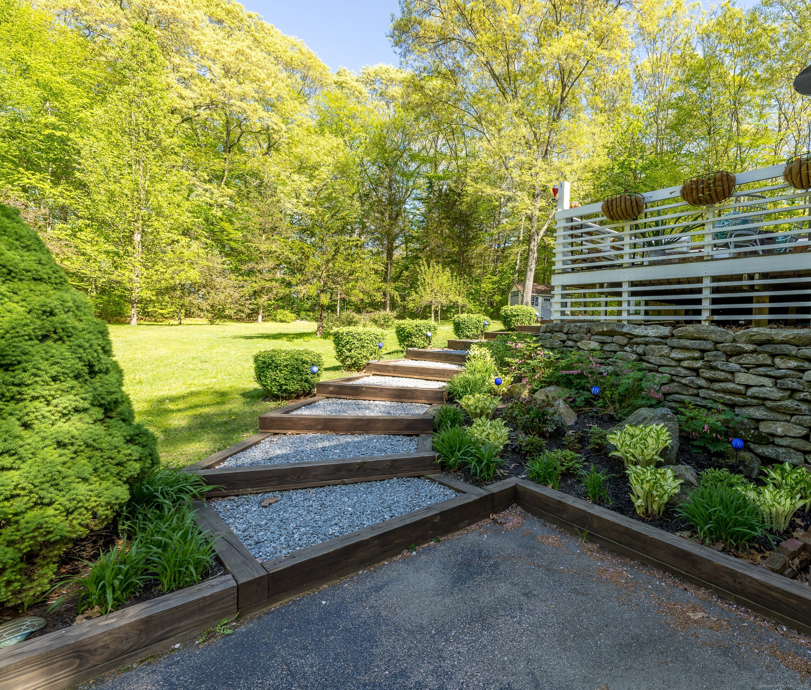 Sellers are Motivated! This property is the epitome of charm and modern comfort-truly a place to fall in love with! There are 5 pages of upgrades and renovations! From the moment you step through the front door, you're greeted by a cozy living room featuring a propane log fireplace, perfect for those chilly New England nights. It's the kind of space that instantly feels like home. The kitchen and dining area, seamlessly open to the great room, create an inviting flow that's ideal for both everyday living and entertaining. And let's talk about that natural light-those first-floor windows flood the space with warmth and brightness, making every corner feel alive and welcoming. Now, the second floor? That's where the magic continues. The primary bedroom suite is nothing short of a dream come true, complete with a full dressing room and closet that feels like your own private boutique. Add in two additional bedrooms and a full bath, and you've got a layout that's as functional as it is beautiful. But wait, there's more! Step outside and you're greeted by a stainless steel outdoor kitchen-perfect for summer barbecues and al fresco dining. The perfect home for all!