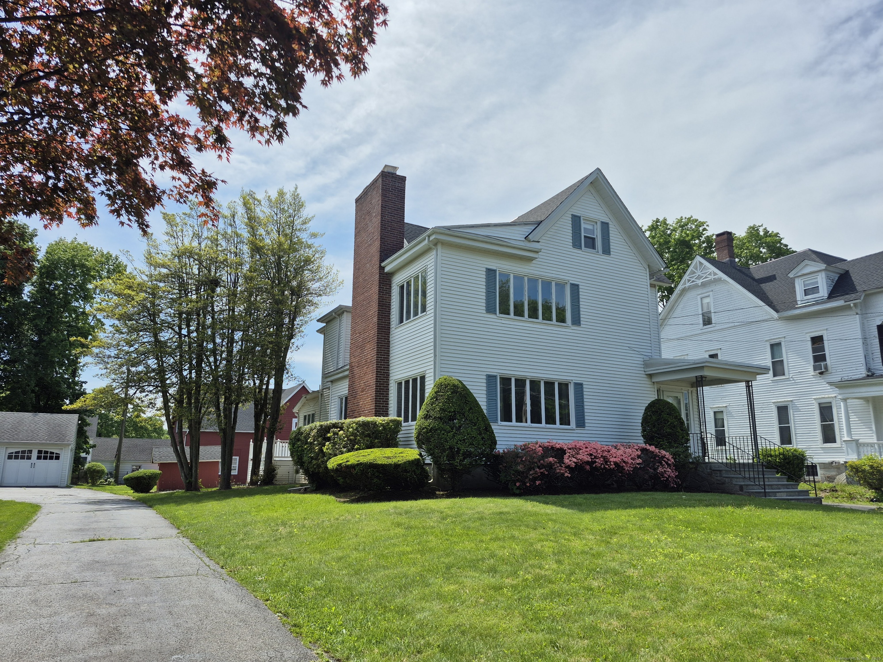 This grand Victorian 4-6 bedroom home would be the perfect home for an extended or multi generational family. Own a piece of Danbury History from the "Hatting Era" in this stately Victorian colonial built in 1880 with modern-day conveniences. This beautiful vintage home displays a Grand Entrance off one of the most beautiful tree-lined streets in Danbury. This home reveals preserved historic woodwork and original beauty starting with the wood floors to the authentic solid staircase, paneling, and built-in cabinets adding to the charm. The home boast 4 bedrooms on the second floor with 2 full baths. A further staircase takes you to the 3rd floor Attic with a large expansive finished rooms once used as bedrooms, sitting area, & large storage rooms with a full bathroom. On the main floor, you are welcomed by spacious dining & living rooms where extended family and guests will have ample room at gatherings along with a 1/2 bath & fireplace and a den. In addition, the large unique Barn in the rear consists of office space (once heated), a large garage bay to fit up to 5 vehicles. Upstairs, the large area with vaulted ceilings was converted to a Basketball Court/game room once used by family members and neighbors as a gathering spot. This is a great opportunity to live and work at the same property. Close to all amenities and commute to I-84/I-684. Chimney recently capped, Front roof and roof around chimney replaced in 2021. Barn roof replaced in 2021.