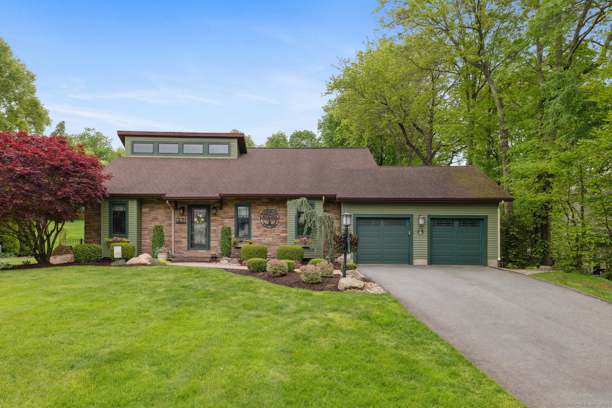 Why build when you can move into a newly renovated, pristine home with top-of-the-line finishes? Featuring a beautiful private yard with putting green, sport court and exceptional amenities, this well maintained & designed 4-bedroom + office , 2.5 bathroom home has been updated with attention to details and features throughout. The first floor includes hardwood & porcelain tile flooring, shiplap ceilings and 5 year old trim, solid doors and top grade Anderson windows. The beautiful open kitchen boasts custom cabinets, high-end finishes and appliances; quartz & marble countertop & backsplash, custom oak vent hood, Sub-zero refrigerator & Wolf ovens, pot filler, & upgraded pullouts for easy access & storage. The open layout flows into both living, dining & family rooms with thoughtful design in vaulted ceilings, woodwork beams, built-in shelving and wainscoting. French-doors lead directly out to the backyard oasis, complete with pergola, fire pit & bowls, well matched shed, lush landscaping and stonework - a perfect extension for entertaining family, friends and relaxing. 3 good-sized bedrooms with window seating in each, updated full & half baths with marble & mold-proof beadboard coverings, an open office with walk-in linen closet and laundry room w/utility sink plus soundproofing round out the first-floor. Upstairs you will find the private primary bedroom suite with full walk-in closet, open & airy master bath w/oversized rain shower and double vanities.