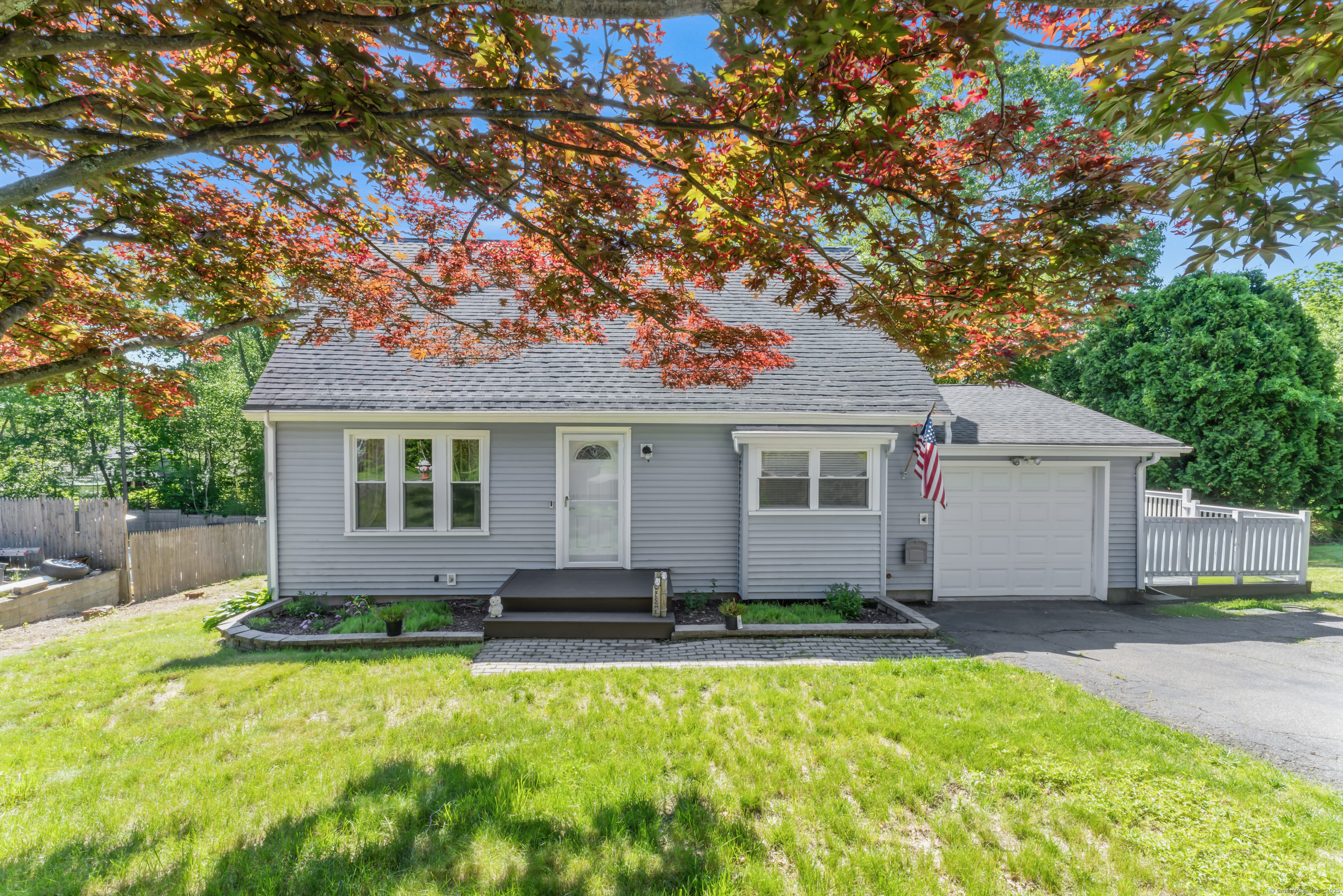 Stop and take a look at this Cape located in the Maple Hill School district. The main level features a bright and open living room seamlessly connected to the dining area and beautifully remodeled kitchen, complete with a center island, granite countertops, and stainless steel appliances. A cozy bedroom with a charming window seat and an updated full bath complete this floor.  Upstairs, you'll find two spacious bedrooms, each with walk-in closets, along with a second fully renovated full bath. The finished lower level offers a generous and expansive recreation room, a media/TV room, and walk-out access to the backyard.  Additional highlights include French doors, thermopane windows, a generator hookup, and an expansive deck-featuring a 16-foot covered section perfect for summer entertaining.  Ideally located just minutes from schools, shopping, parks, and Metro-North, with convenient access to I-84, I-8, and Routes 63, 68, and 69-making for an easy commute to Fairfield County, lower New Haven, Hartford, and Westchester.