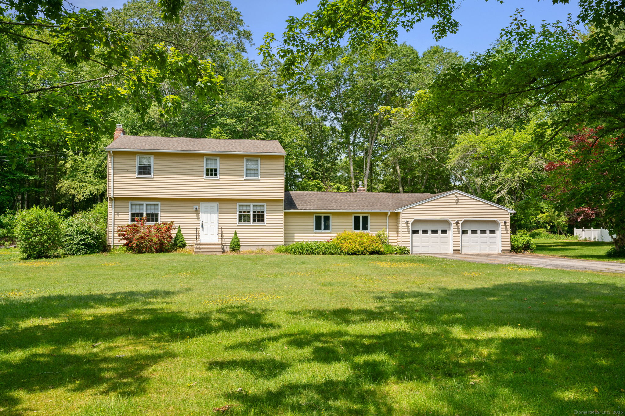 Discover a rare gem in the picturesque town of Chester, Connecticut, with this charming 3-bedroom, 2.5-bath colonial home. Nestled on a private 2-acre lot, this property is a dream come true for horse lovers, featuring a barn that offers ample space for your equestrian needs and a chicken coop. Enjoy direct access to nearby state forest trails for riding or exploring. As you step inside, you will be welcomed by a spacious living room featuring a cozy fireplace, perfect for those relaxing evenings. The home also boasts a large family room that opens to a beautiful wood deck, providing a wonderful space for entertaining and enjoying serene views of your expansive property. Upstairs, you will find a spacious primary suite complete with a walk-in closet and a full bath, offering the privacy and comfort you deserve. Chester is known for its delightful eateries, unique galleries, and quaint shops, creating a vibrant community atmosphere. Additionally, the scenic Connecticut River is just a stone's throw away, providing excellent opportunities for boating and fishing, ideal for any outdoor enthusiast. With its convenient location, you are only 2.5 hours from both New York City and Boston. This is a unique opportunity to own a beautiful home in a storybook setting. Embrace the lifestyle you've always dreamed of in this enchanting property!