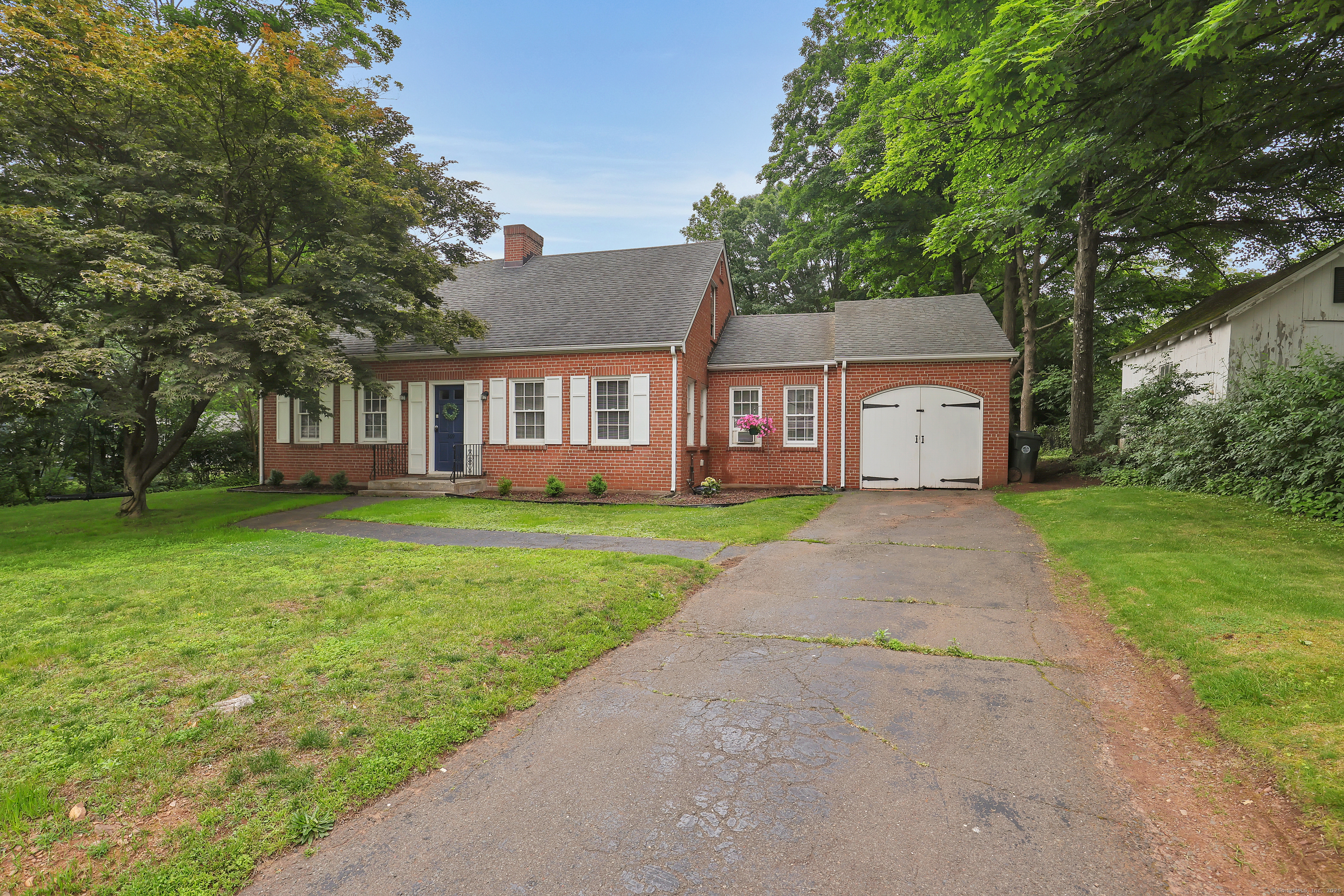 Welcome to 369 Main Street, East Berlin - a beautifully maintained brick cape that blends timeless charm with modern updates. This rare gem offers incredible curb appeal and sits on a spacious lot.  The main floor offers a spacious, light-filled layout featuring a kitchen, dining area, living room, and a bonus family room, along with a convenient half bath and access to a walk-out back porch. Upstairs, you'll find three comfortable bedrooms and a full bath. The home also includes a spacious basement with ample storage and a striking grand fireplace-perfect for future finishing or additional living space.  With tasteful renovations throughout, this home is move-in ready while still offering opportunities to make it your own. Located in the heart of East Berlin, just minutes from local shops, schools, and highways.  Don't miss your chance to own a piece of East Berlin. Sold as-is
