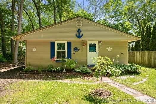 Deeded ocean private beach rights with great year round or rental income potential. All newly updated within the last 5 years, roof, windows, joists, gutters, insulation, flooring, kitchen granite countertops, bathroom & landscaping. Multiple tree limbs removed & loft area added. This 2-bedroom ranch with an open floor plan & coastal charm is just a short stroll to the sand! The kitchen features granite countertops, stainless steel appliances, and flows seamlessly into a vaulted-ceiling living area filled with natural light. Well insulated for excellent energy efficiency, this home offers low heating costs and features a charming corner pellet stove that adds both warmth and ambiance and a handy shed provides extra storage. Generously sized bedrooms provide plenty of space and comfort. Enjoy membership in the sought-after Giants Neck Heights Beach Association, which includes access to a private beach, boat launch, clubhouse, tennis & basketball courts, and a playground. Conveniently located just minutes from the highway and downtown Niantic-offering great restaurants, shopping, local events, and the scenic Niantic Bay Boardwalk. Perfect for year-round living or a summer getaway. Come make your ocean life dreams a reality!