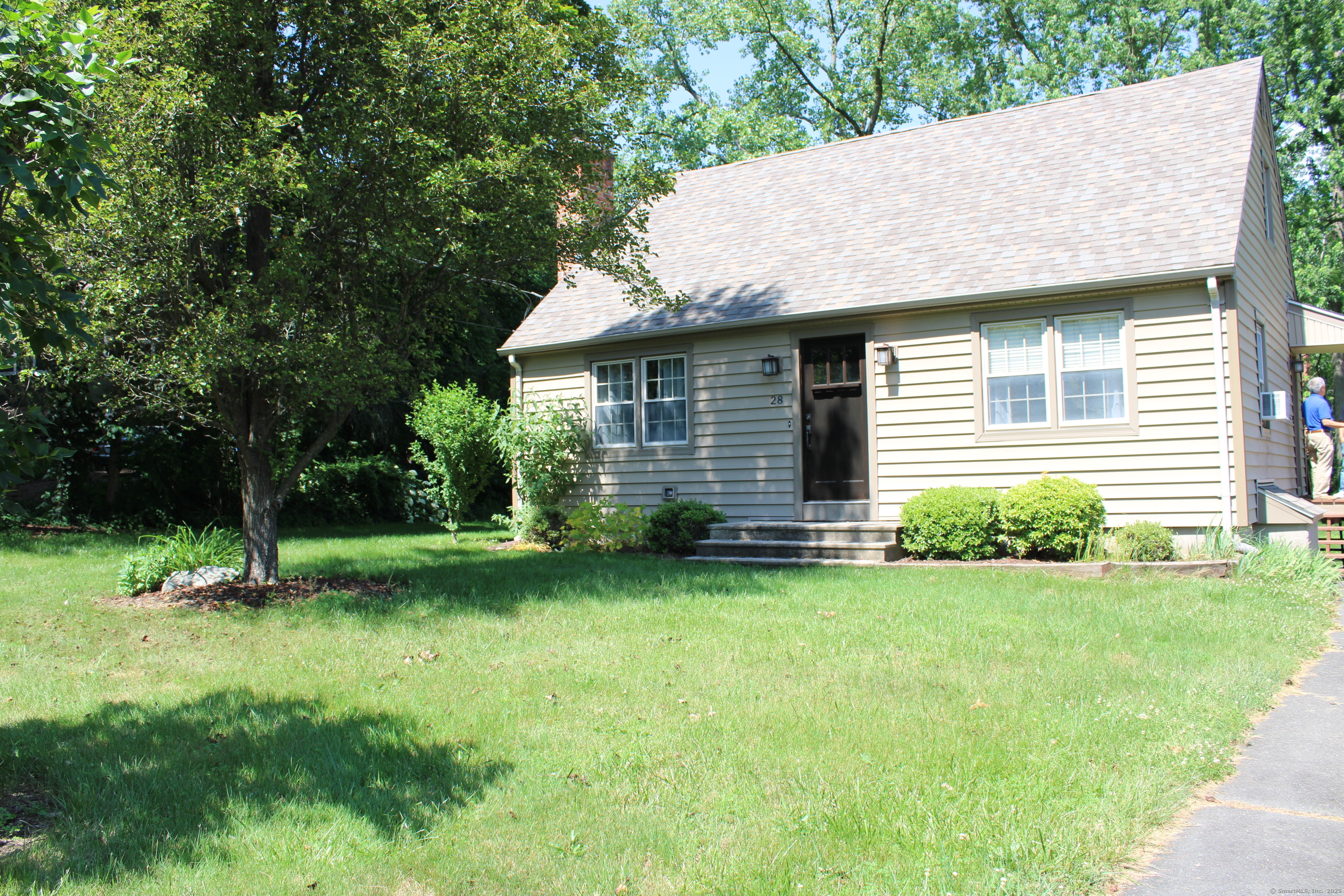 Move in and make dinner in this Cozy Cape with 2 spacious bedrooms on the upper level, a full bath and laundry on the upper level. The main level den is currently used as a 3rd bedroom and has sliders to the private back yard. Updated kitchen and dining room. This home offers hard wood floors throughout and A fireplace insert for the chilly season. The yard is nicely manicured with mature perennials on a level lot in a quiet neighborhood.