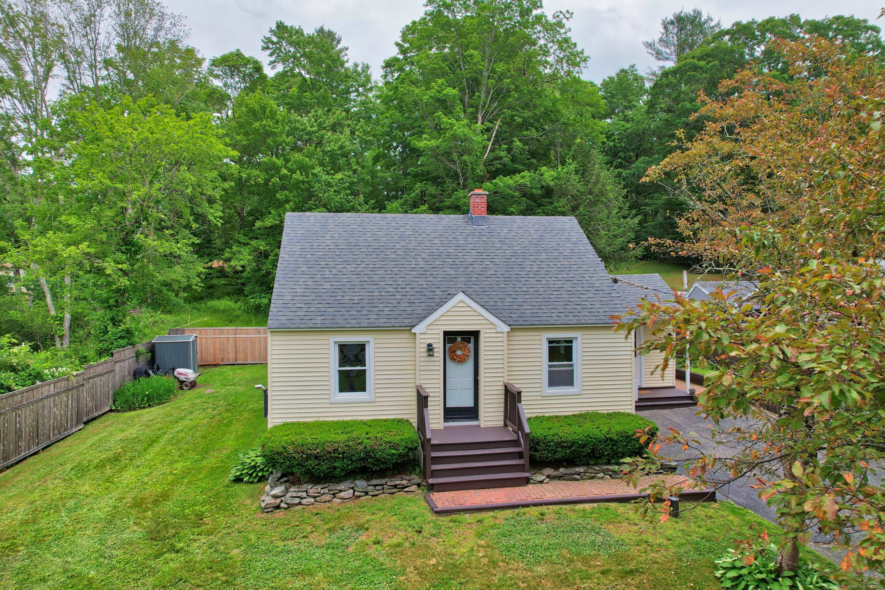 Lovingly maintained by its recent owner, this adorable cape-style home blends classic charm with everyday comfort. The partially finished basement offers flexible space, ideal for a family room, home office, or personal gym. Upstairs, an additional room currently used for storage holds great potential for future expansion or customization. Step outside to a private, partially fenced yard with newer fencing which is perfect for relaxing, entertaining, or pets. Located in a sought-after Harwinton neighborhood and connected to city sewer, this home is a wonderful opportunity!