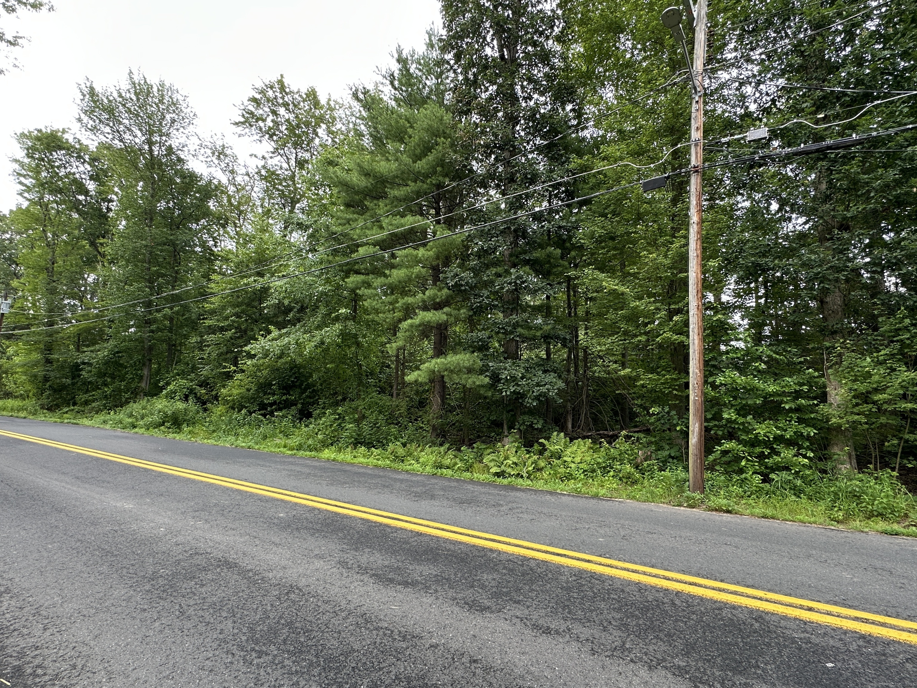 1.44 Acre approved R-3 building lot. Get your site plan approved, perc test will be required.