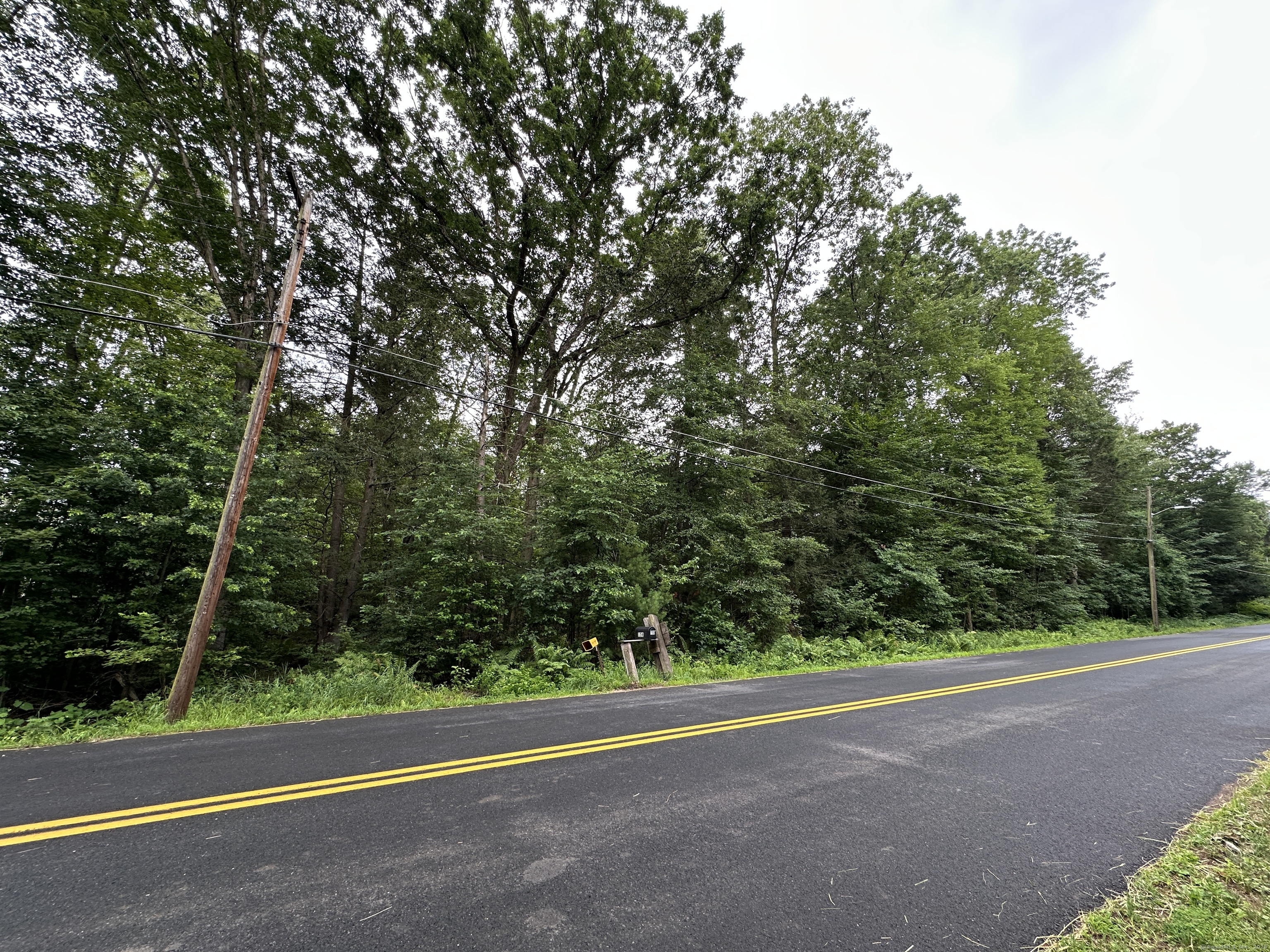 Approved 2.51 acre R-3 Building lot. 380ft of frontage along Scantic Rd. Perc test will be required, get your site plan approved and build!