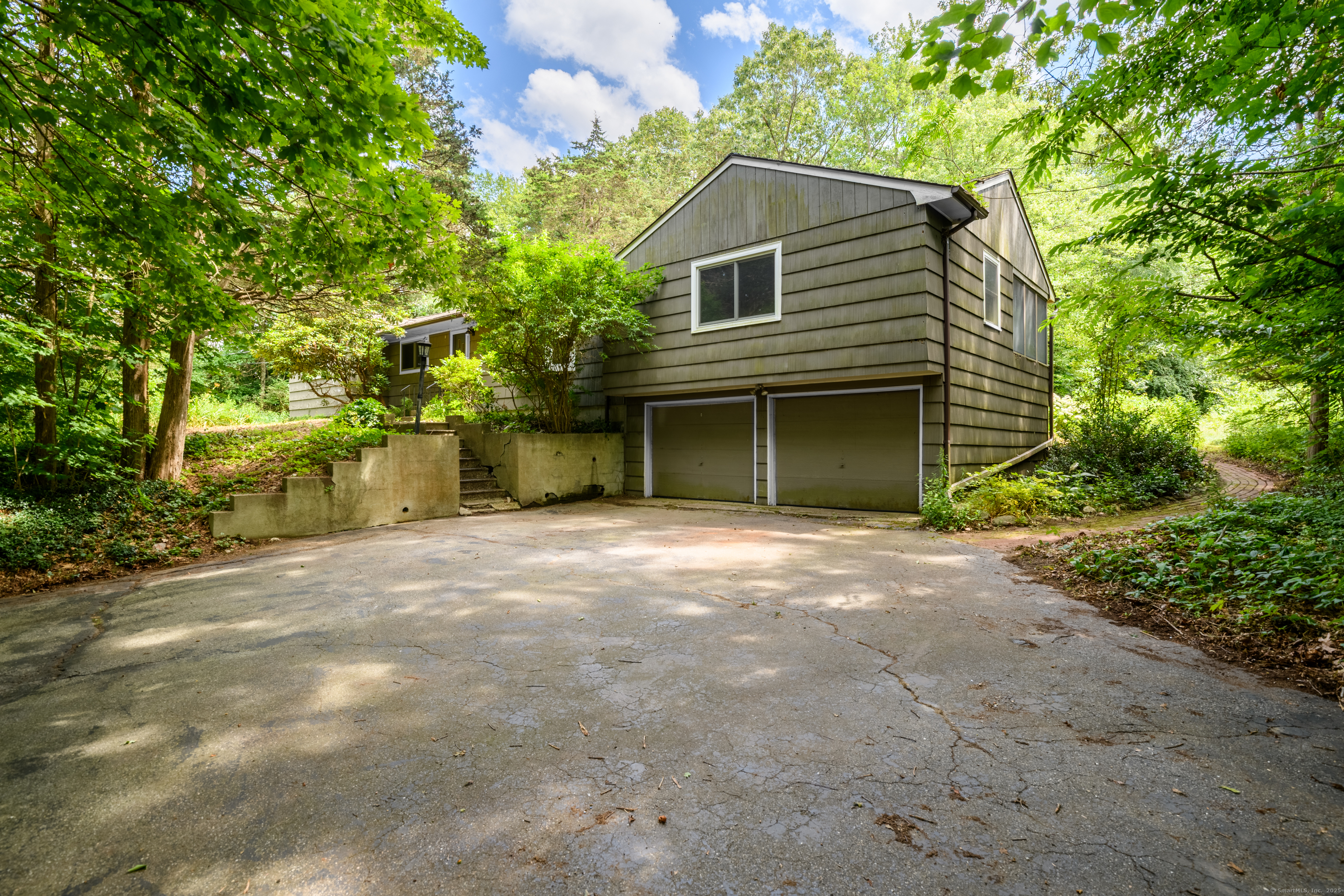 Bring your vision-and your toolbox. This 4-bedroom, 2-bath ranch in peaceful Bethany is a rare chance to start fresh. Whether you're an investor hunting for your next project or a buyer ready to build equity, this home offers solid bones, hardwood floors throughout, and a layout full of potential.  Natural light pours through large windows, and the 3-season screened porch adds bonus space to enjoy the setting. The yard is generous and ready for landscaping to bring it to life. Inside, everything needs work-kitchen, baths, systems, and finishes-but the footprint is there for something truly special.  This is not a move-in ready home. It's a blank slate, waiting for someone with vision, sweat, and a plan. The reward? A chance to create exactly what you want, in a town known for its space, and strong community feel. Located in the award winning Amity School District.