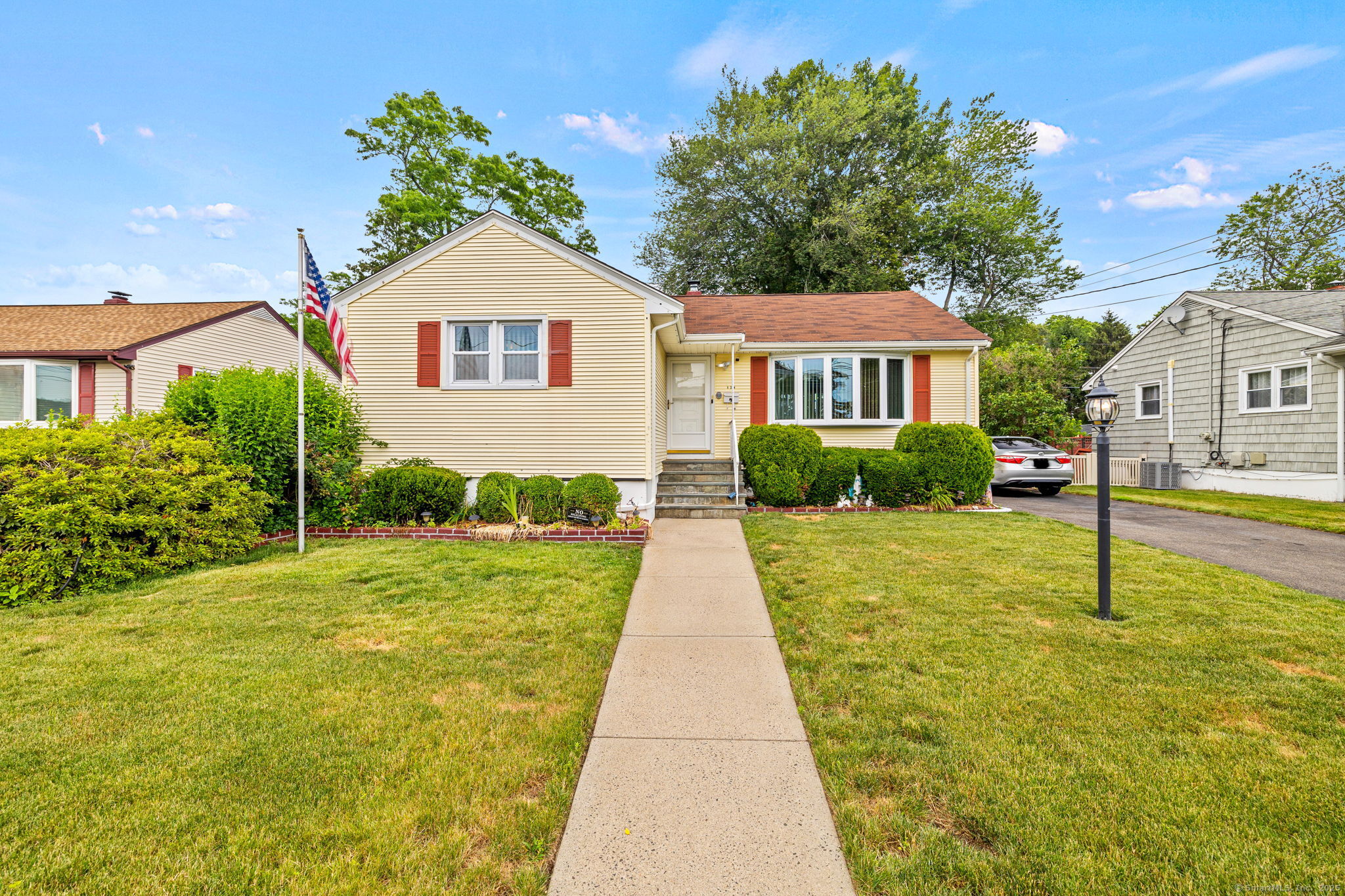 Welcome to 128 Auburn Street! This beautiful 3 bedroom ranch with 2 full bathrooms has so much to offer a new homeowner looking for a fresh start at any stage of life.  This home has been meticulously kept by the same owners for over 25 years! The house may seem small at first glance, but it boasts over 2,000 sqft of living space. Enjoy an eat-in-kitchen with ample space for a large kitchen table to host and entertain guests. Just off the kitchen with a hop down the stairs you have a finished basement with another full bath and an additional room that can be utilized as a fourth bedroom. The laundry room is conveniently located just outside of the utility room.   This home needs nothing to move in and includes lovely features: gleaming hardwood floors throughout, a gorgeous bathroom covered in stone, a modestly updated eat-in-kitchen with a gas cooktop, cabinet-mounted oven, gorgeous wood cabinets, and stone counters.  How could I forget the pool and deck combo?! We also have a single-car garage with an automatic opener. Your outdoor features are just as attractive as your indoor features; we have you covered!   The mechanics of the home have also been upgraded. Take as many showers as you want this summer with a new on-demand tankless water heater, which provides both heat and hot water. The independent central AC system will keep your home mighty cool during those hot summer days. Let's not forget the newer vinyl windows and maintenance-free vinyl siding.