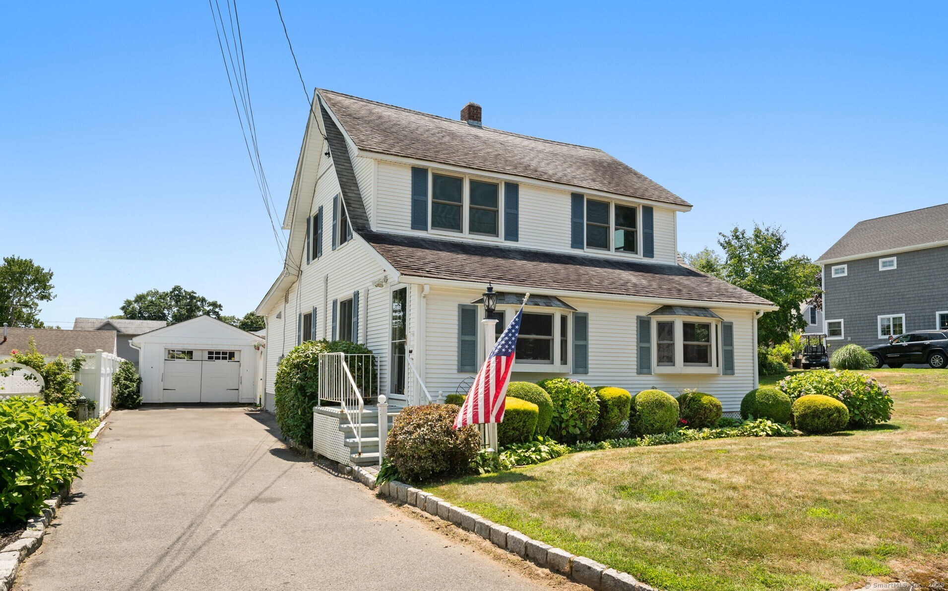 Charming 3-bedroom /1.5 bath year-round home in Black Point Beach Club situated on a double lot offering loads of possibilities and located just up the street from the water with your choice of sandy beaches. Recently refreshed and ready for new ownership, this property is sure to please. Interior features include oil baseboard heat, HVAC splits for A/C, wood floors, modern eat-in kitchen, beautiful fieldstone fireplace, Thermopane windows and a large sunroom with access to the back yard. The property includes a separate 1 bay garage with seasonal changing room & shower, gardening shed, pergola sitting area and a large side yard for gardening and recreation. Take advantage of this opportunity to make 22 Indianola your relaxing retreat and enjoy beach style living throughout the year!
