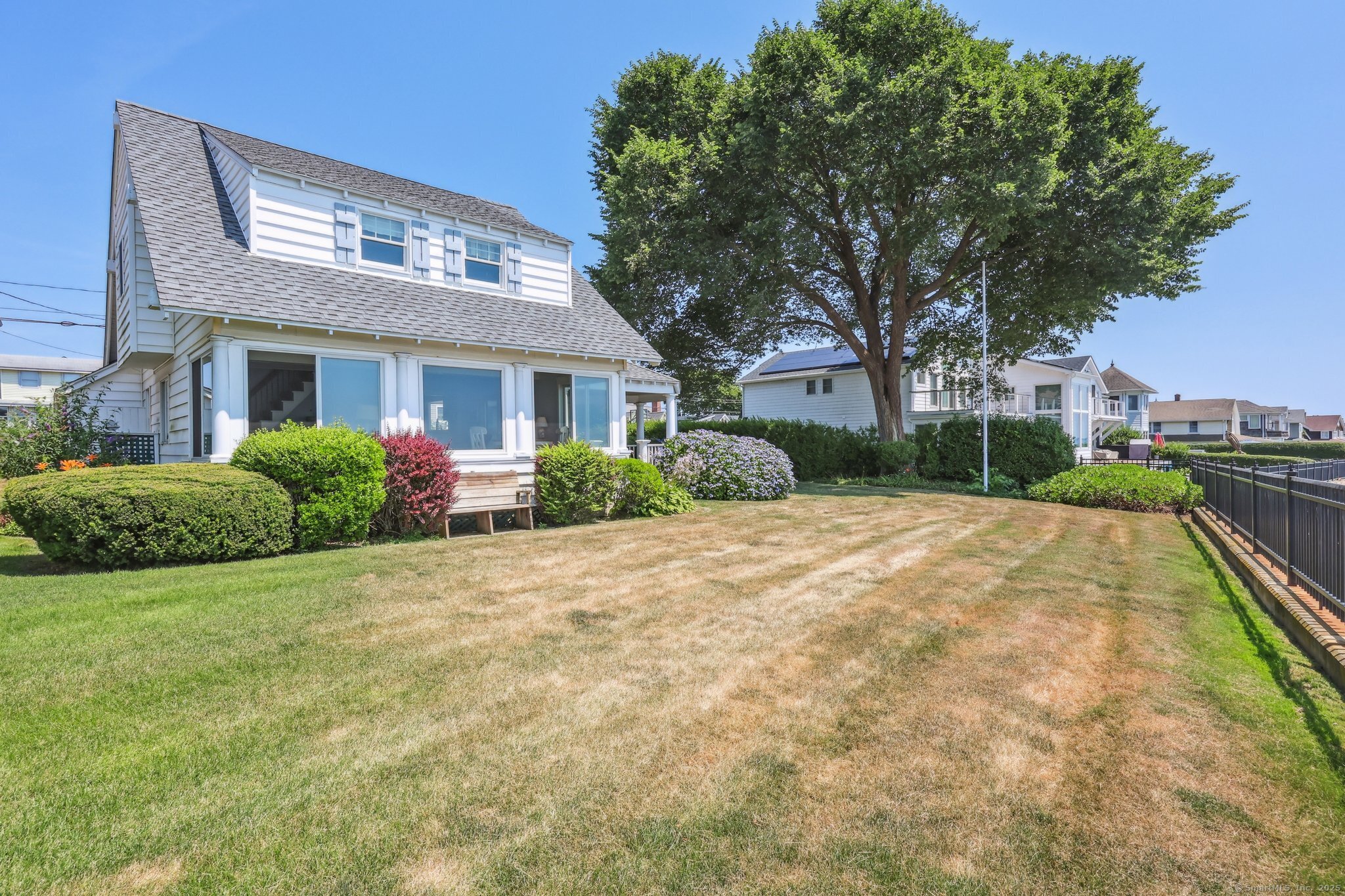 Welcome to your dream coastal escape at 245 Giant's Neck Rd in beautiful Niantic, CT! This charming 4-bedroom, 2-bathroom beach home offers 1,417 sq ft of light-filled living space and 80 feet of direct frontage on Long Island Sound. Imagine waking up to the sound of waves and enjoying your morning coffee on the open porch, where sea breezes and water views create the perfect start to your day. Located in the sought-after Giant's Neck Beach Association, this home gives you access to a private beach, clubhouse, and a vibrant shoreline community. Inside, you'll find a cozy layout designed for easy living and entertaining, with ample space for family and guests. Whether you're hosting summer barbecues, relaxing after a swim, or watching sunsets over the Sound, this home is your front-row seat to coastal living. Easy to convert to a year-round residence or keep it as a weekend getaway, this is your chance to own a slice of Connecticut shoreline paradise.  Don't miss out on homes in this neighborhood, which are rare and go fast!   Schedule your private showing today and start living the beach life you've always dreamed of!